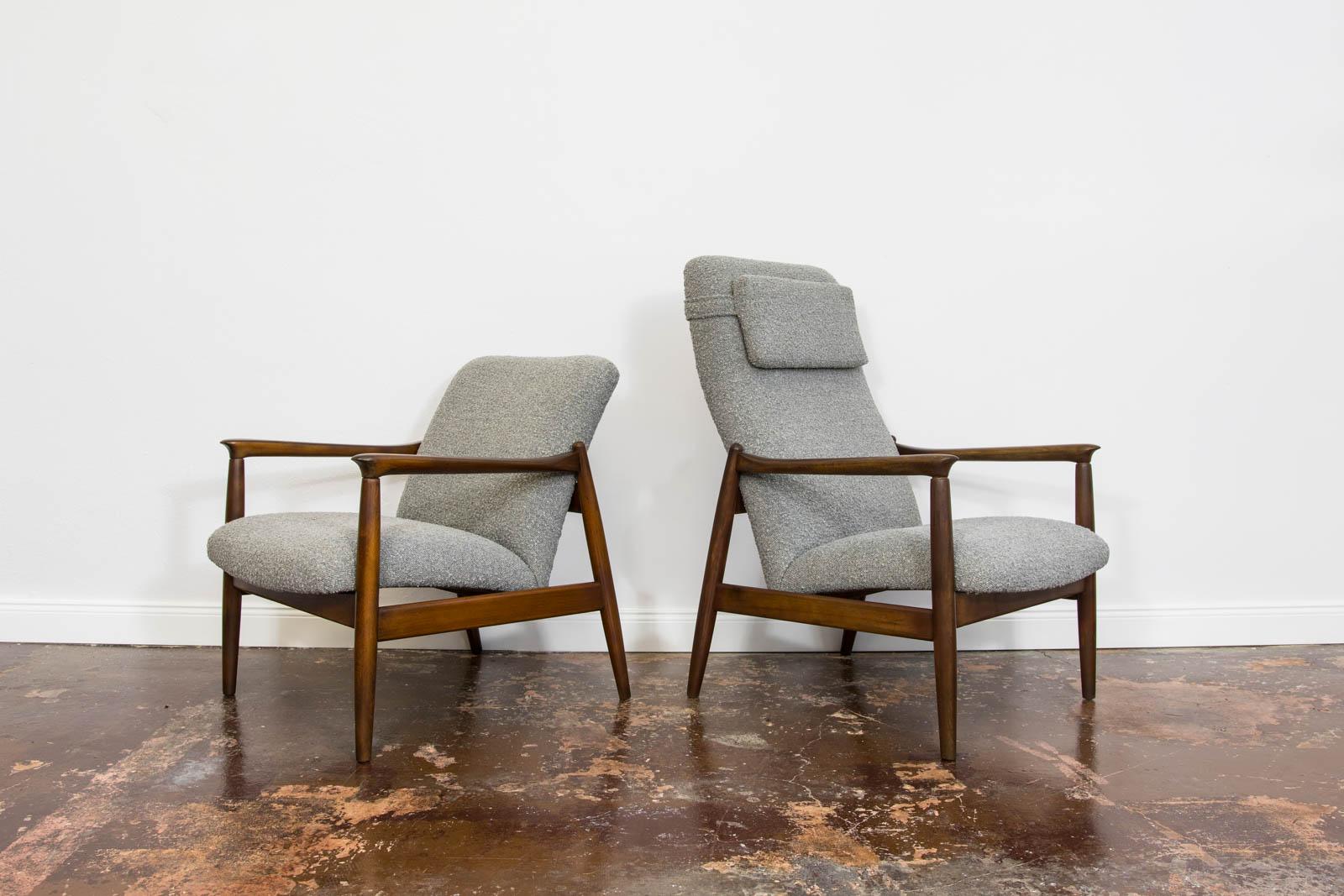 Armchair GFM-64 and high back GFM-64 both were designed by Edmund Homa for Goscicinskie Fabryki Meblii, Poland, 1960's. 
Solid beech frames have been completely restored and refinished.
Reupholstered in grey boucle type of fabric. 
We offer fabric