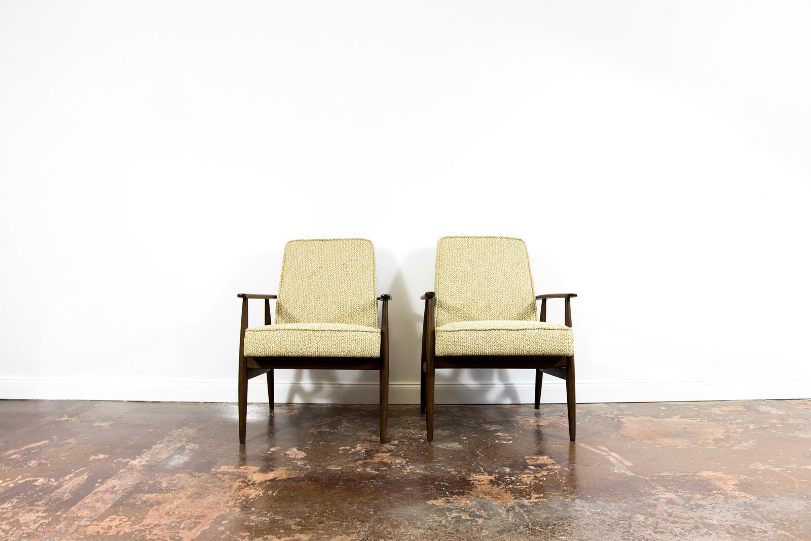 Pair of restored mid-century armchairs by H. Lis, 1960's

Pair of mid-century armchairs Type 300-190 designed by H. Lis, manufactured in Poland, 1960's.
Solid beech wood has been completely restored.
Reupholstered.