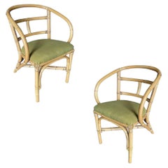 Paire de fauteuils de salle à manger en rotin à accoudoirs Looping du milieu du siècle restaurés