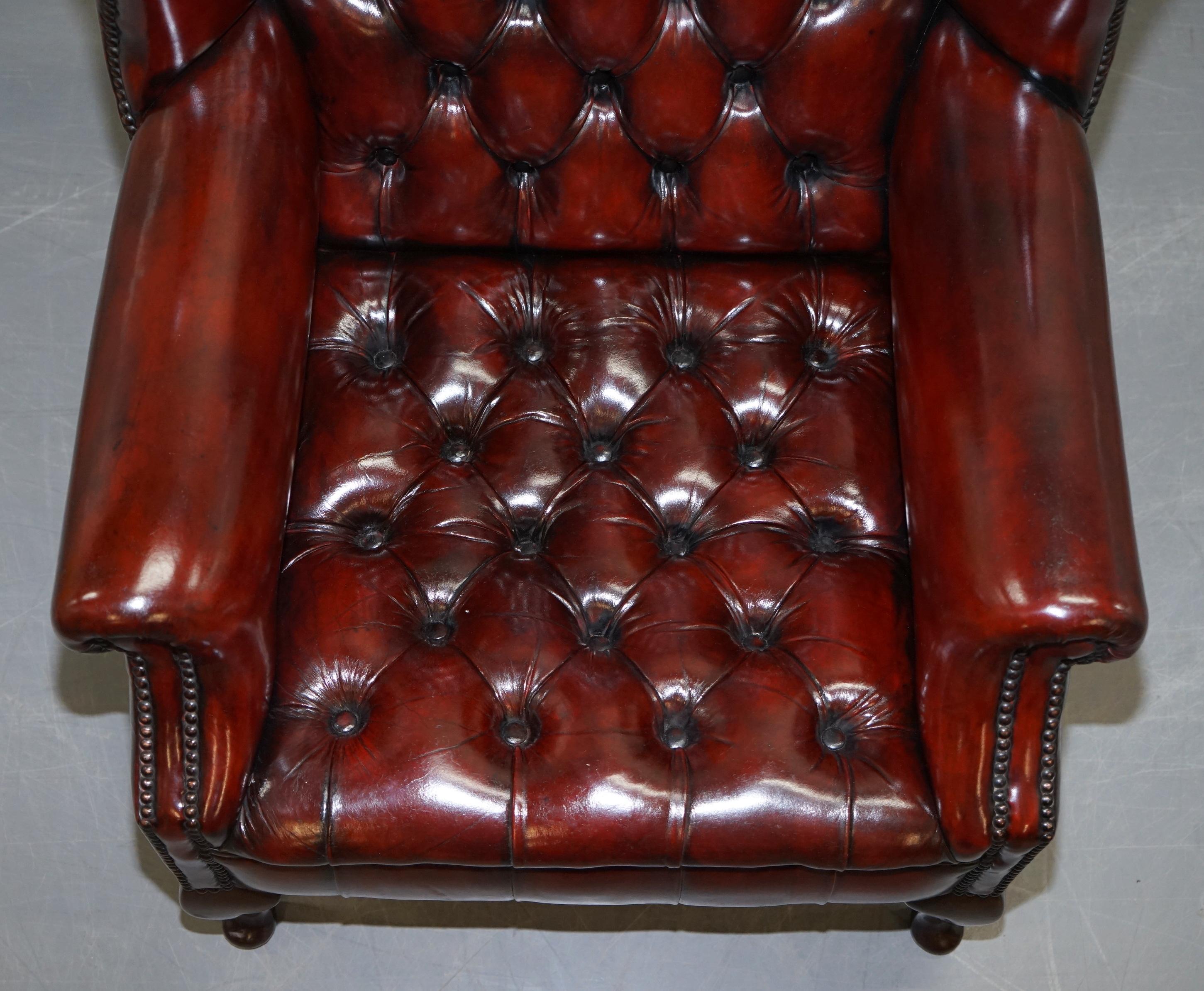 Pair of Restored Oxblood Leather Fully Tufted Chesterfield Wingback Armchairs 7