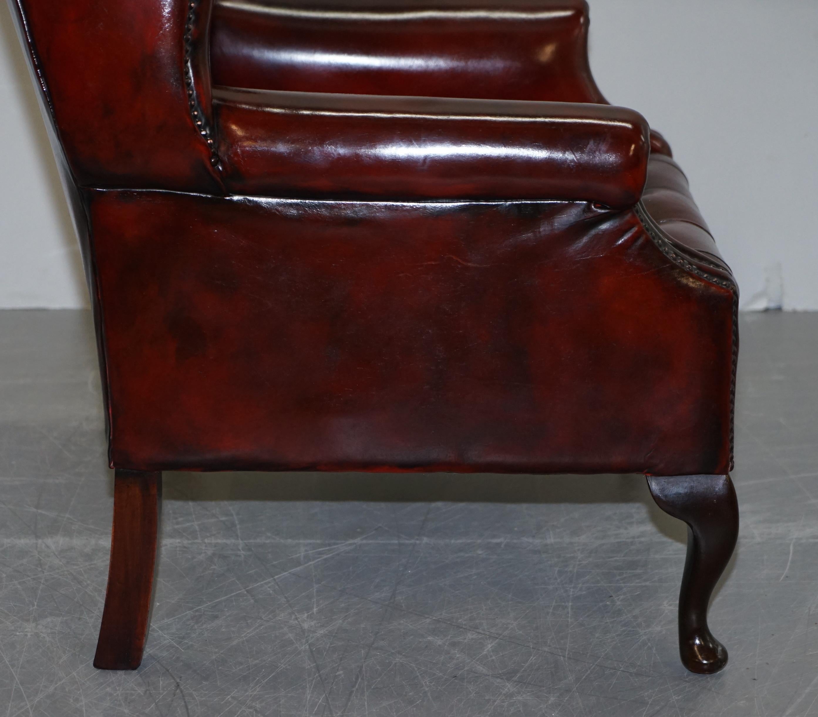 Pair of Restored Oxblood Leather Fully Tufted Chesterfield Wingback Armchairs 13