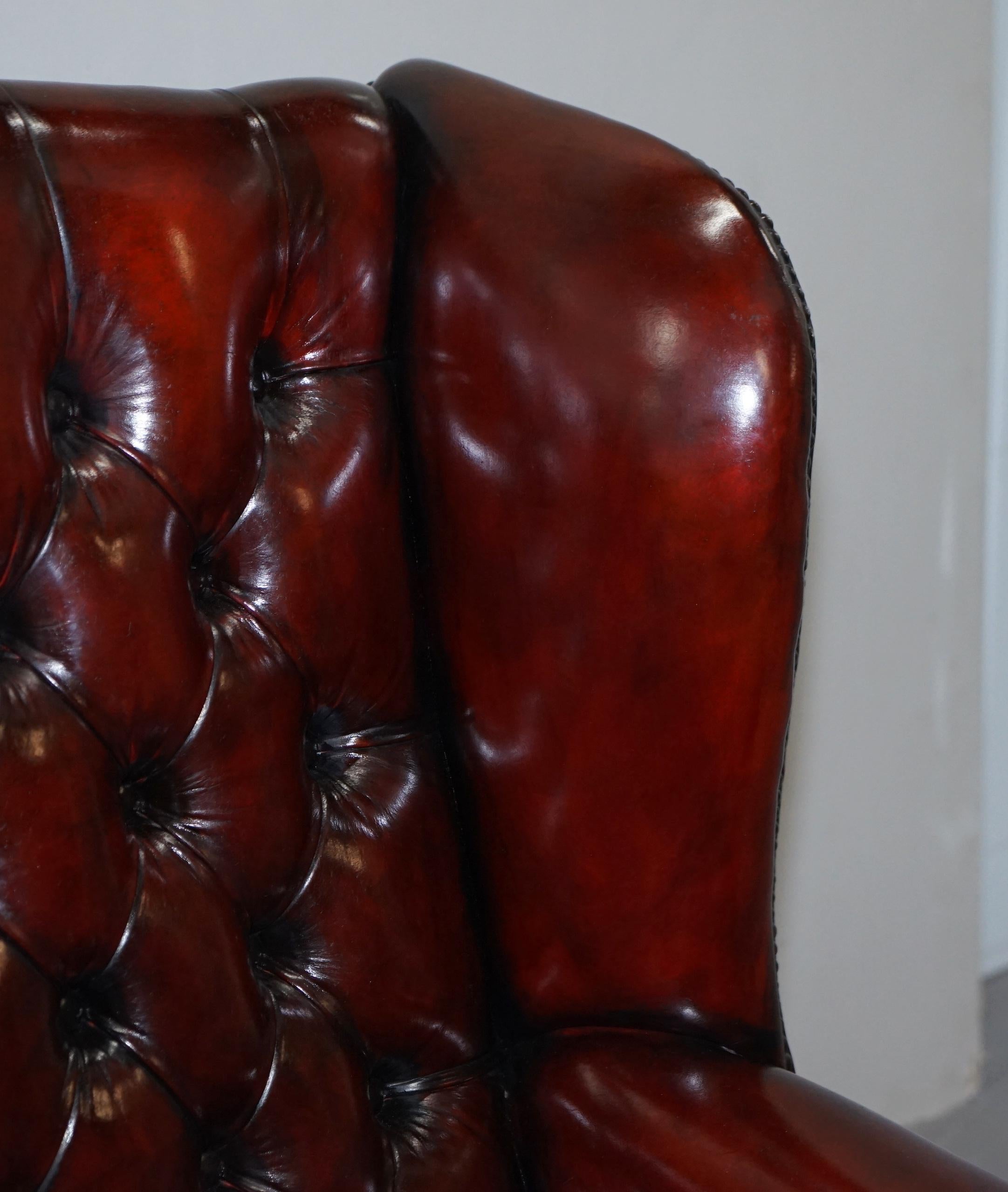 Hand-Crafted Pair of Restored Oxblood Leather Fully Tufted Chesterfield Wingback Armchairs