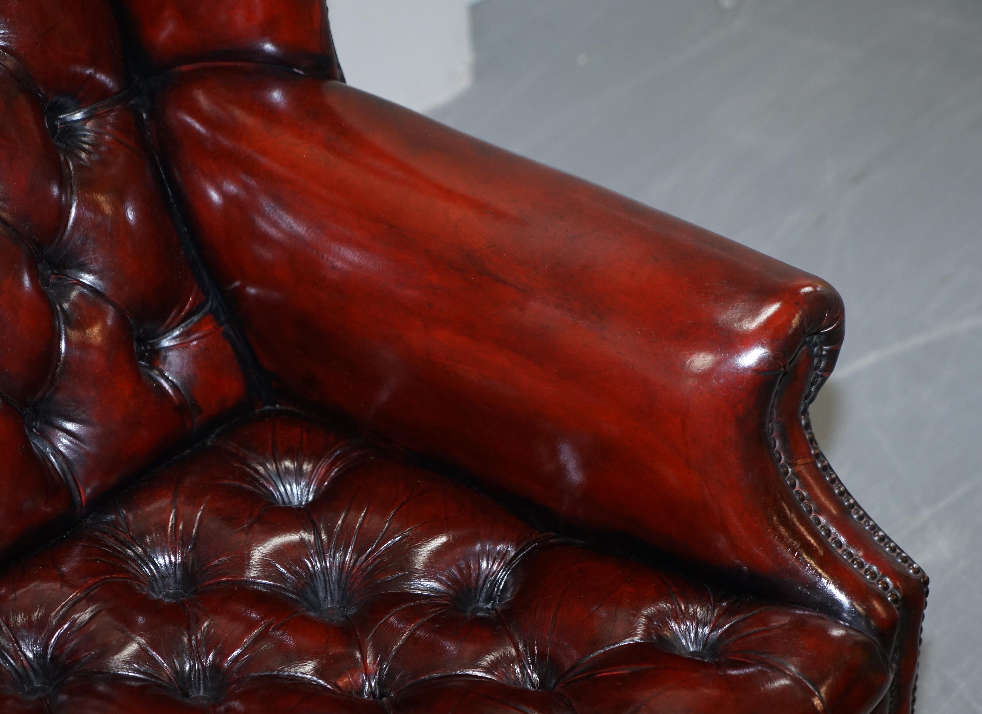 Pair of Restored Oxblood Leather Fully Tufted Chesterfield Wingback Armchairs In Good Condition In West Sussex, Pulborough