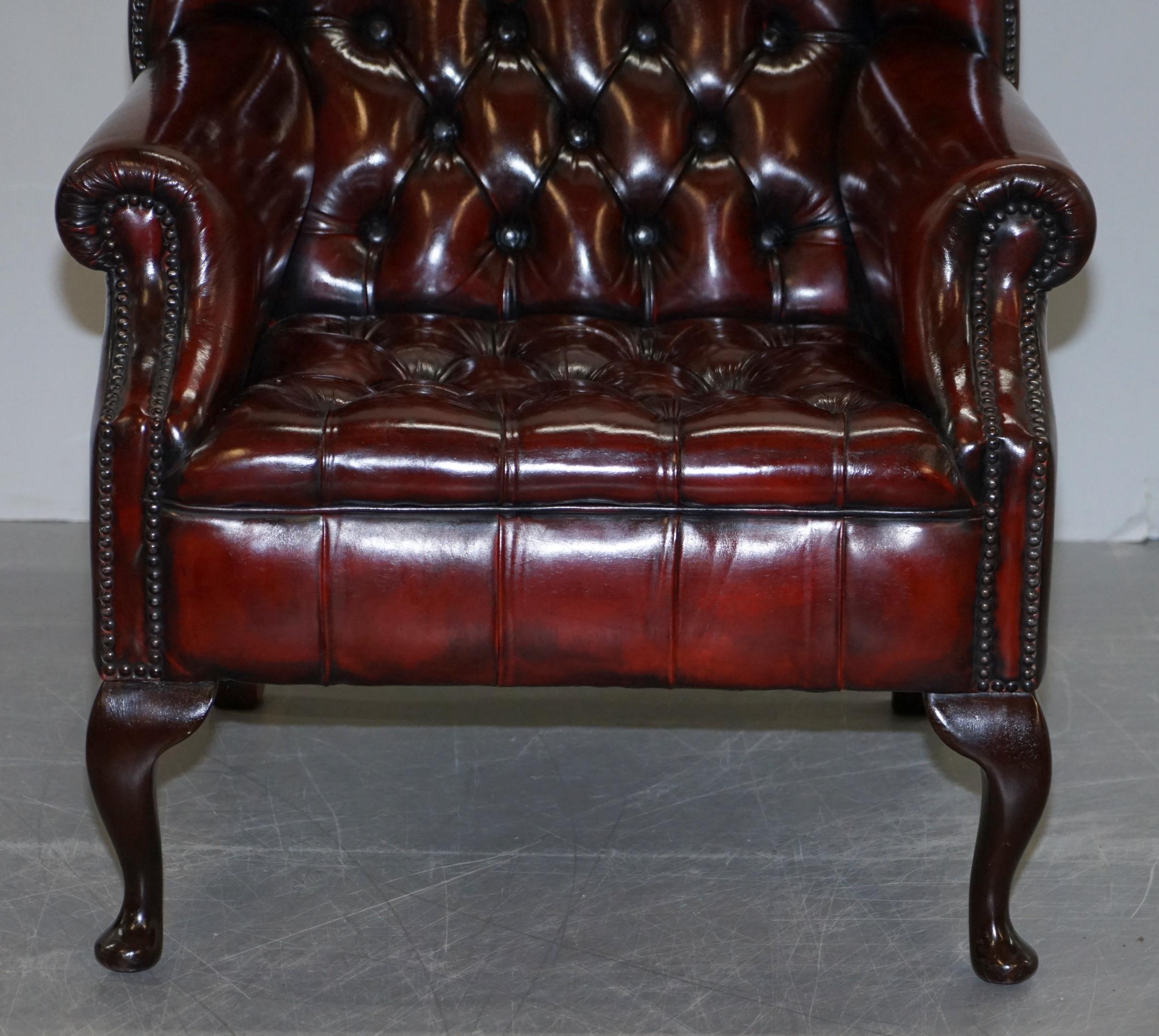 Pair of Restored Oxblood Leather Fully Tufted Chesterfield Wingback Armchairs 1