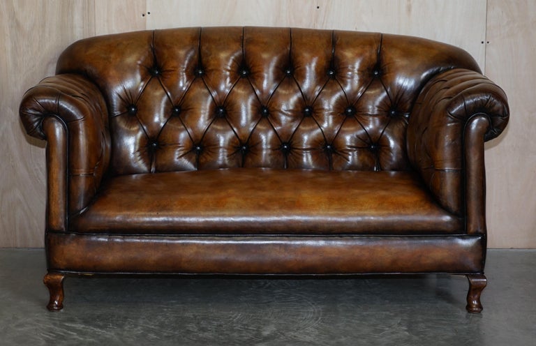 English Pair of Restored Victorian Gentleman's Tufted Chesterfield Brown Leather Sofas For Sale