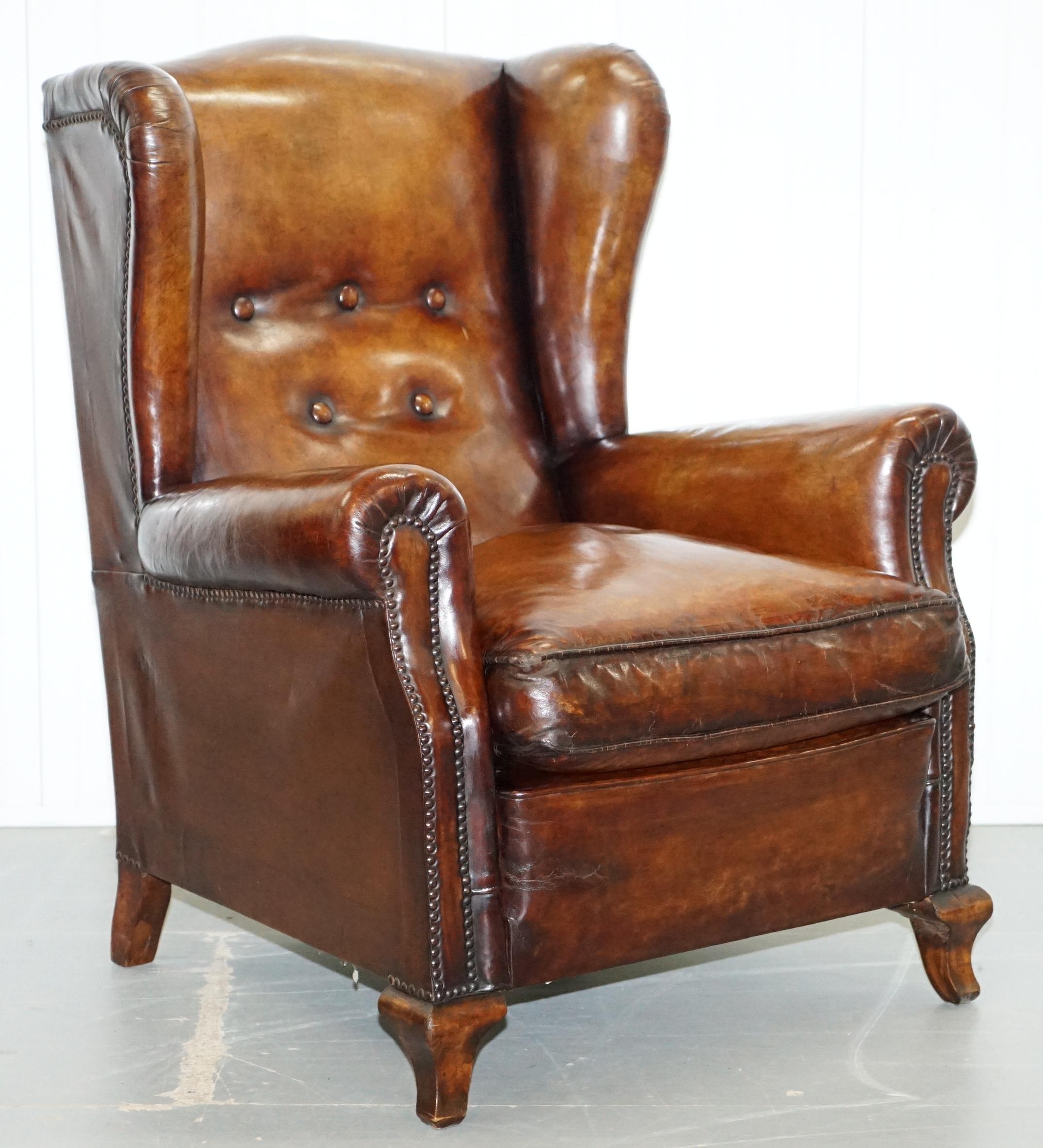 We are delighted to offer this stunning pair of fully restored Victorian wingback club armchairs hand dyed this lovely whiskey brown color.

A good looking and well-made pair, the seat cushions are feather filled and fully leather upholstered on