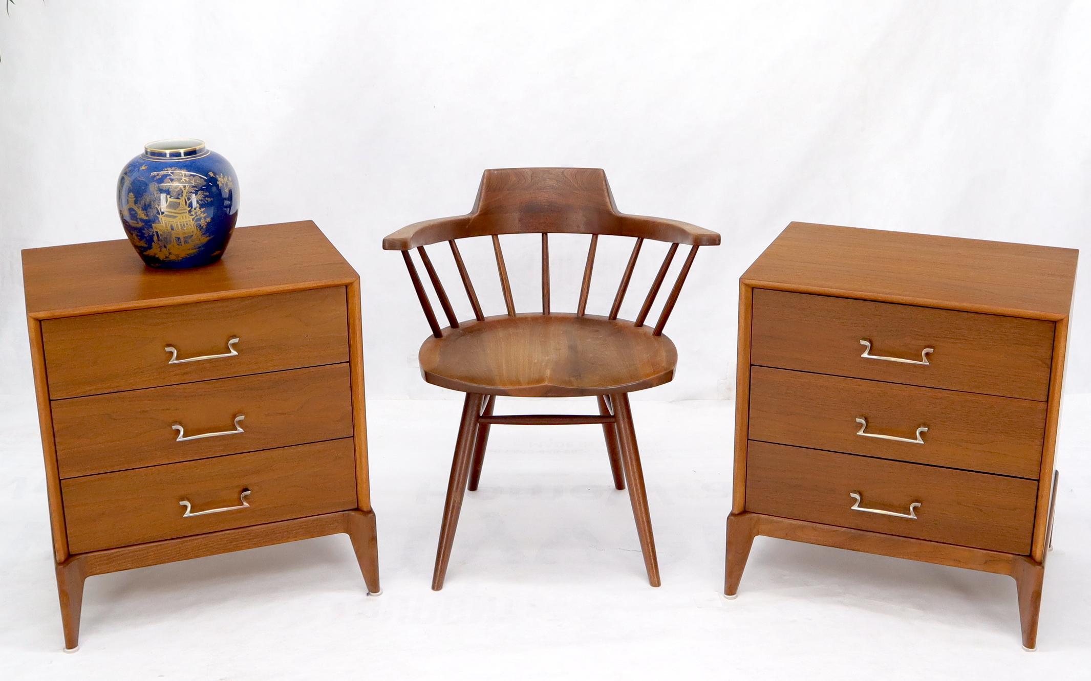 Pair of mid-century modern American walnut three drawers night stands.