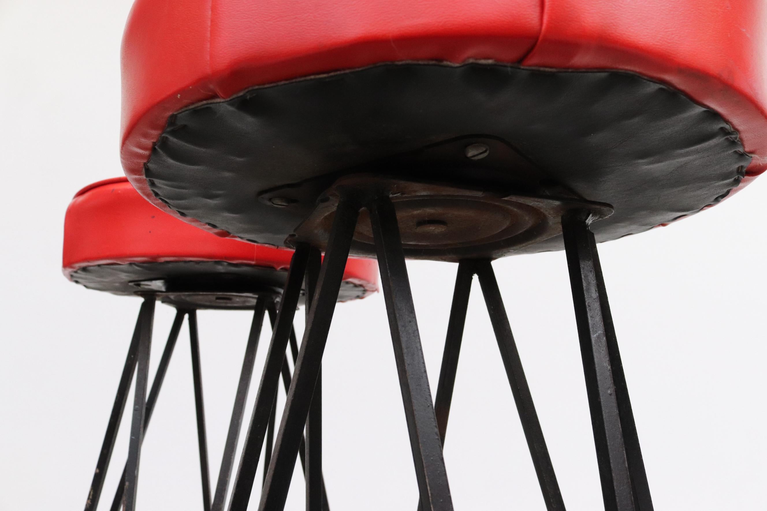 Pair of Retro 50's Round Red Skai Bar Height Stools with Black Base and Legs For Sale 2