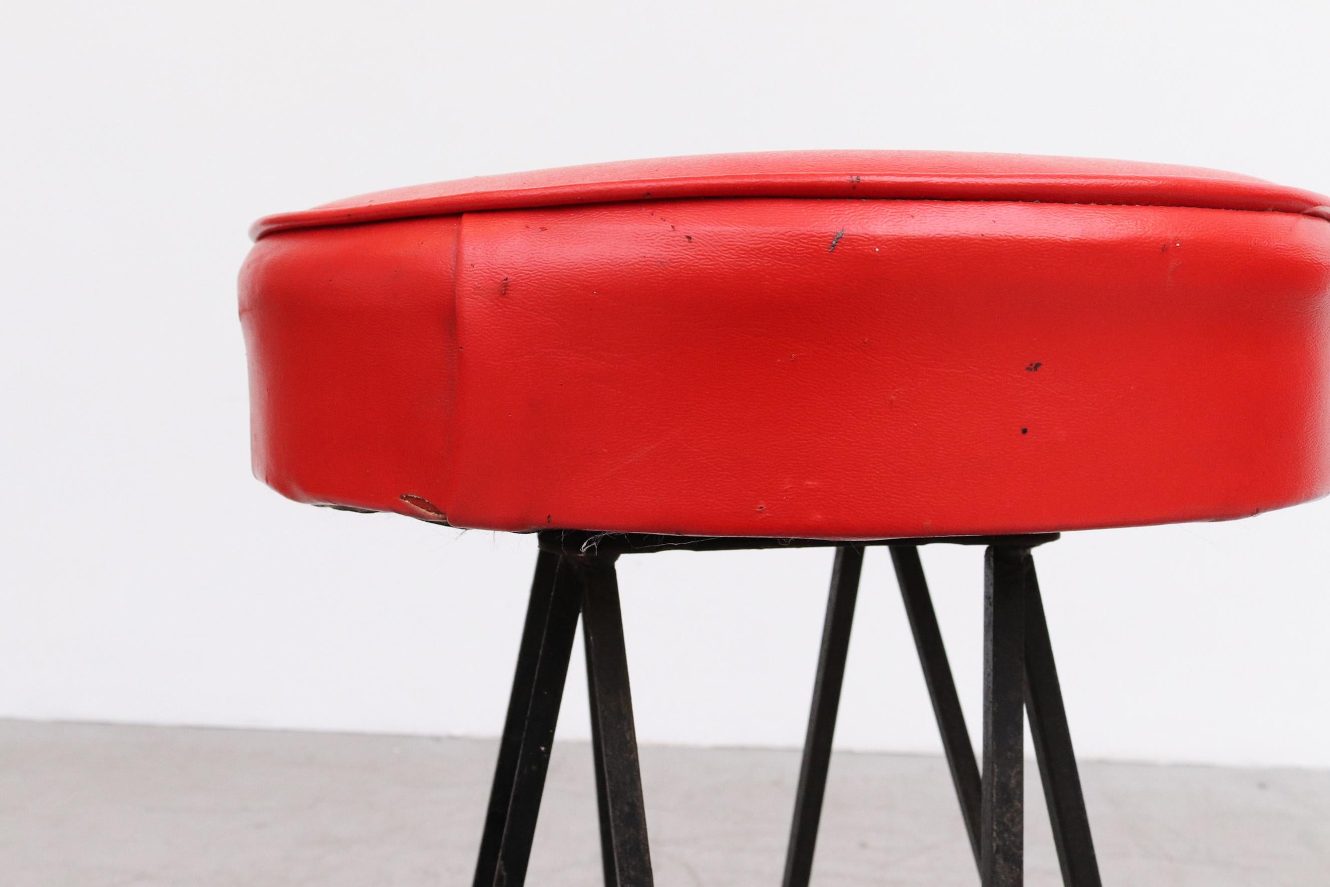 Dutch Pair of Retro 50's Round Red Skai Bar Height Stools with Black Base and Legs For Sale