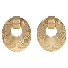 Pair of Retro Gold Oval Disk Clip Brooches with Radial Fluted Surface
