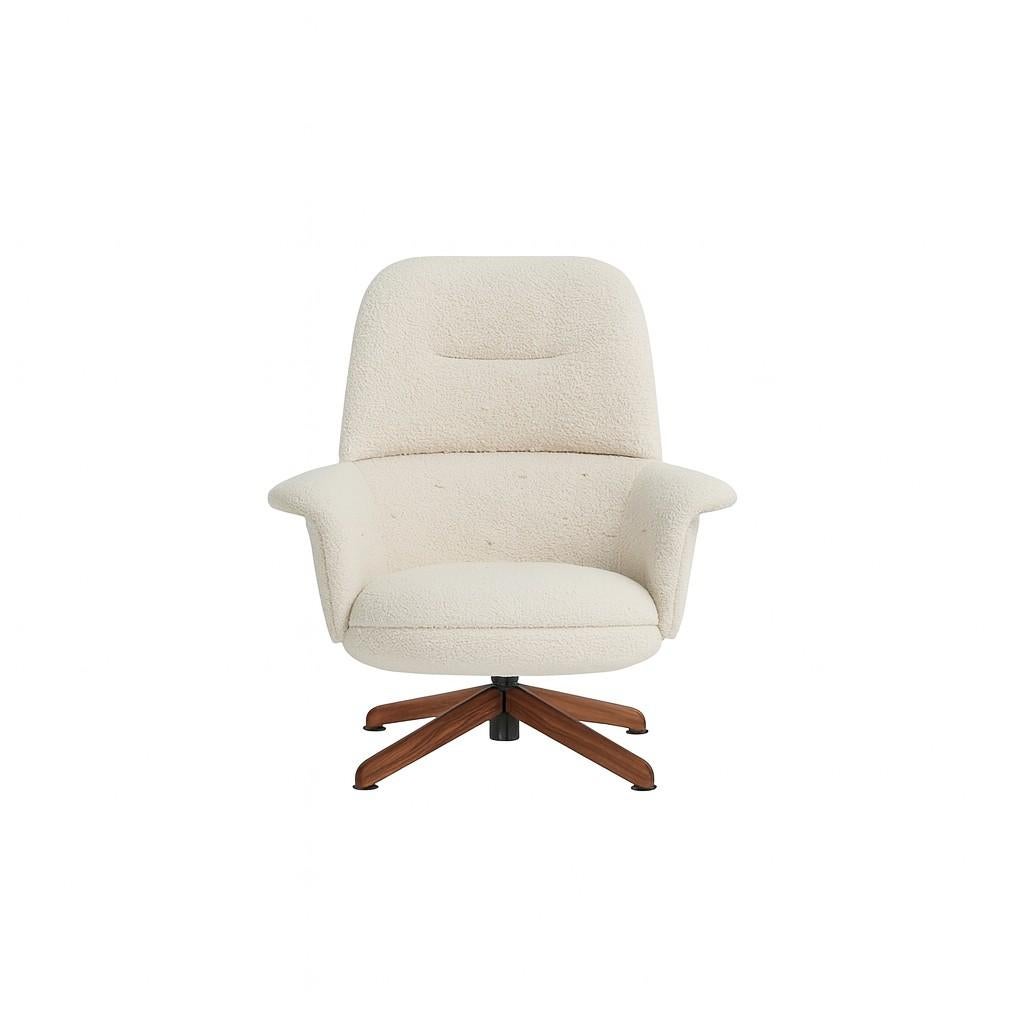 This stylish armchair features a high, upholstered shell and a solid oak wood base, providing a combination of comfort and durability. The unique design allows you to choose two different fabrics for the seat and the surrounding shell, creating a