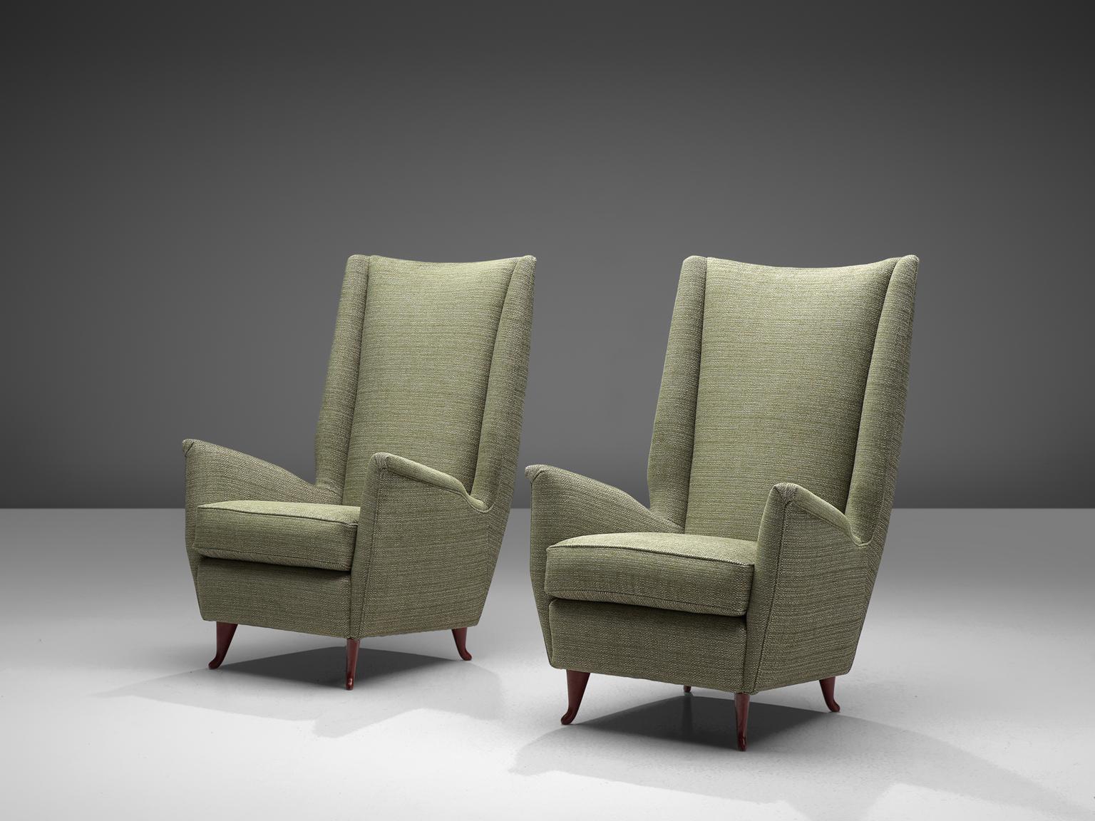ISA, pair of lounge chairs, reupholstered in green fabric and wood, Italy, 1950s. 

An elegant pair of Italian Lounge chairs in the manner of Gio Ponti. What really characterizes this chairs is their high backs in combination with the lumbar