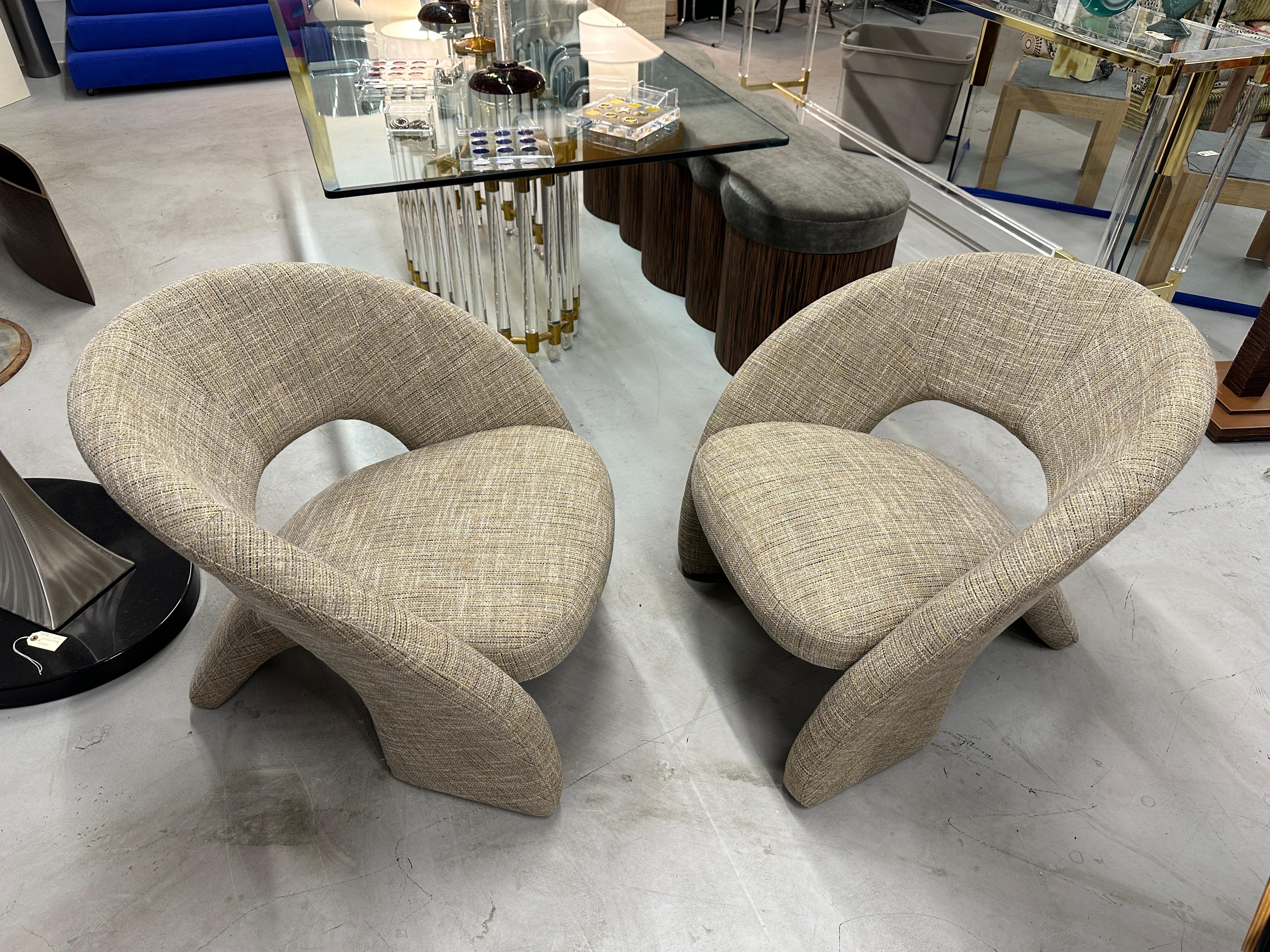 A nice pair of sculptural post modern chairs in the style of Jaymar chairs. We've had these redone and reupholstered in a Citrine Gold Tweed Chenille. They are pictured next to a Herman Miller Palisander Eames chair in our Gallery for scale.