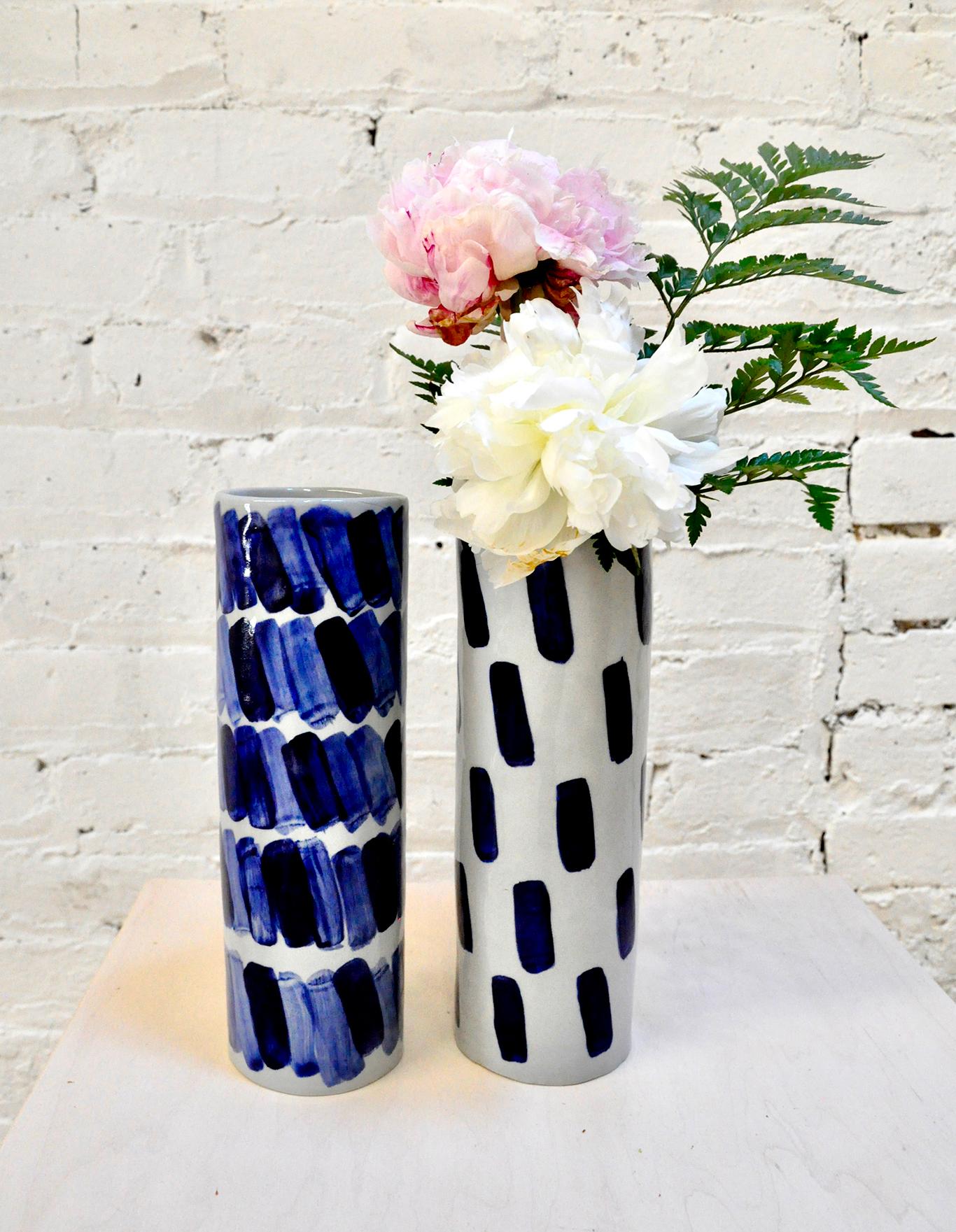 Hand-built vases by Isabel Halley, in hand-dyed pale grey porcelain with striking cobalt glaze brush strokes.

Dimensions: 8