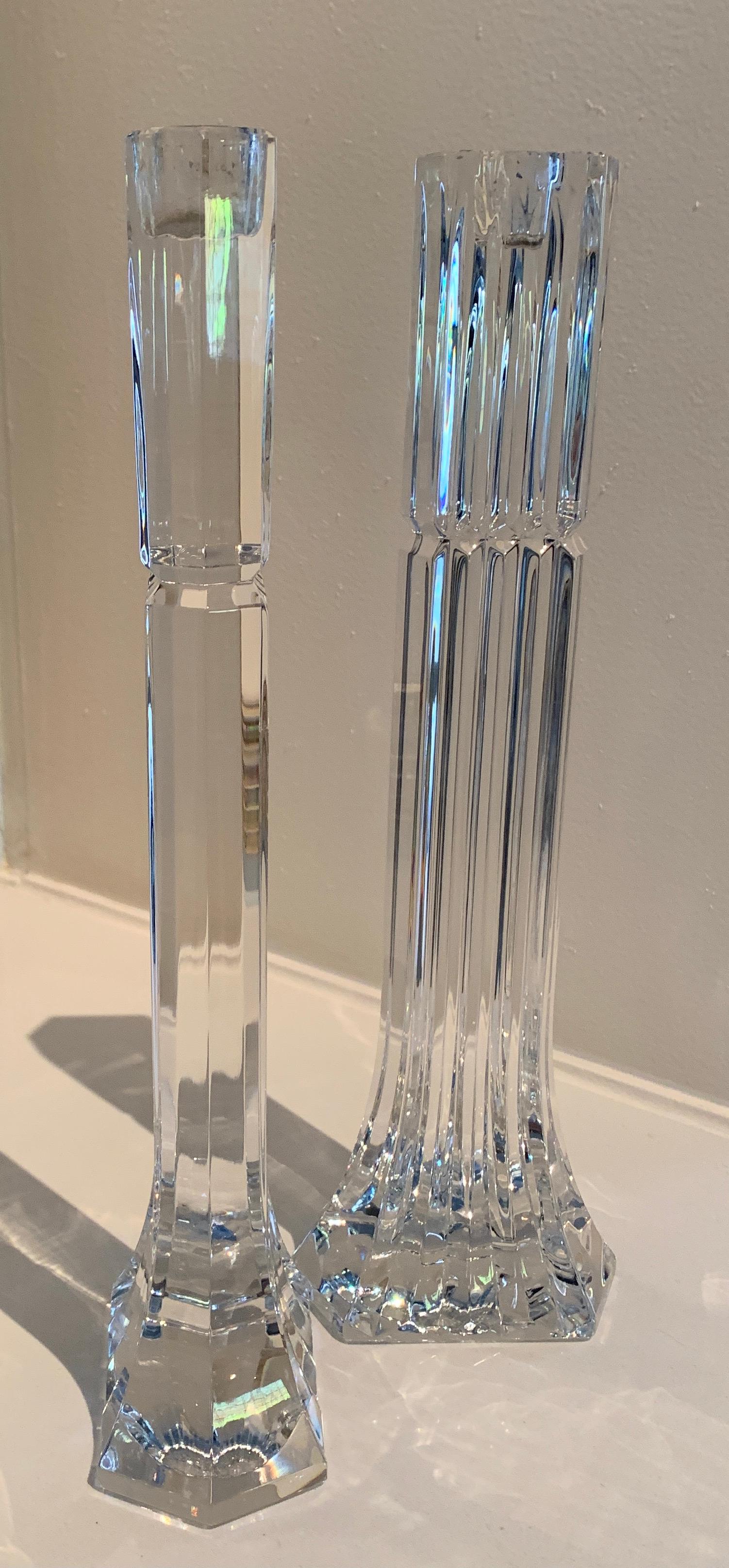 Ribbed crystal candle holders. The pair may any table elegant! also a fine addition to the mantle. The pair are of good weight and have a nice reflective quality.