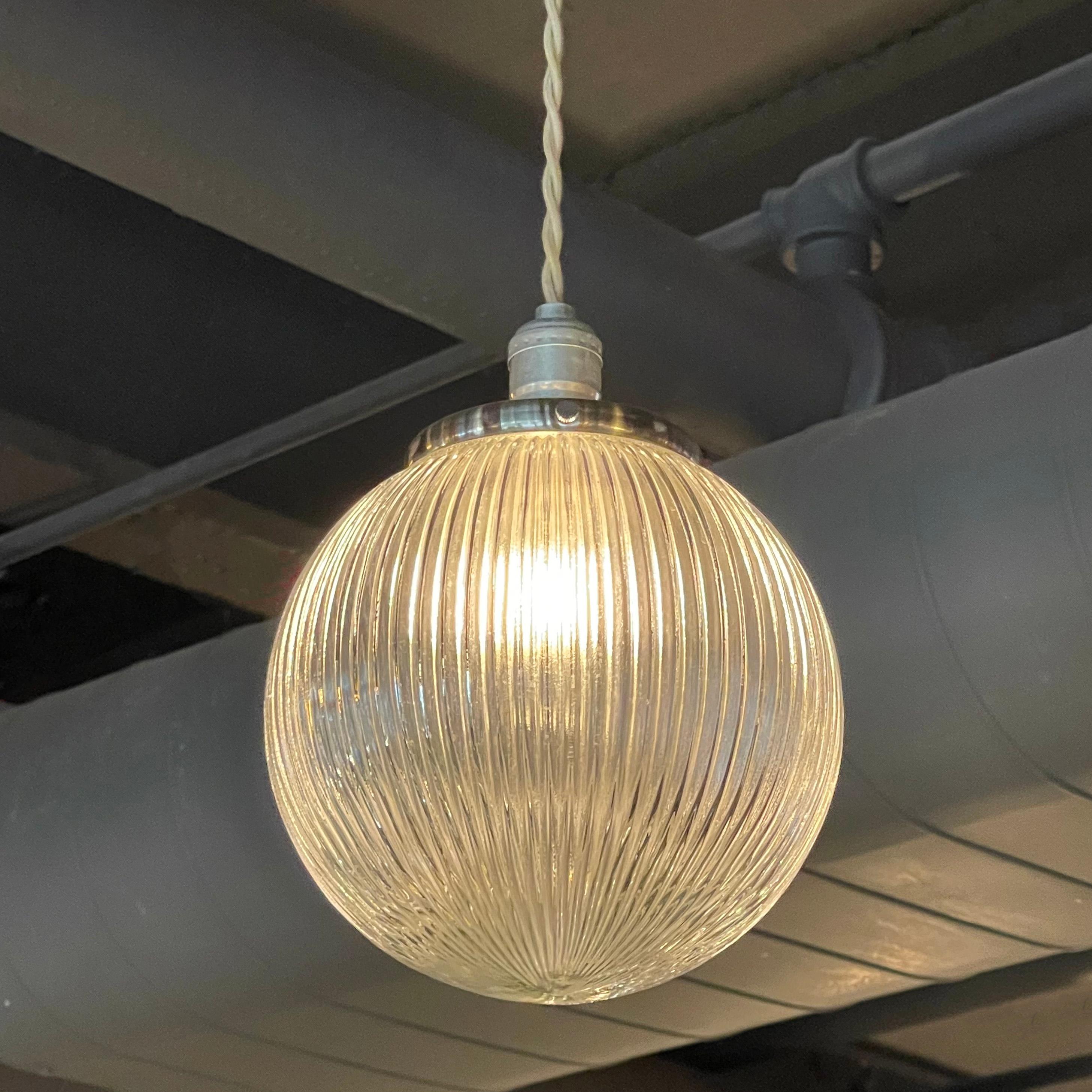 Industrial Pair of Ribbed Glass Globe Pendant Lights
