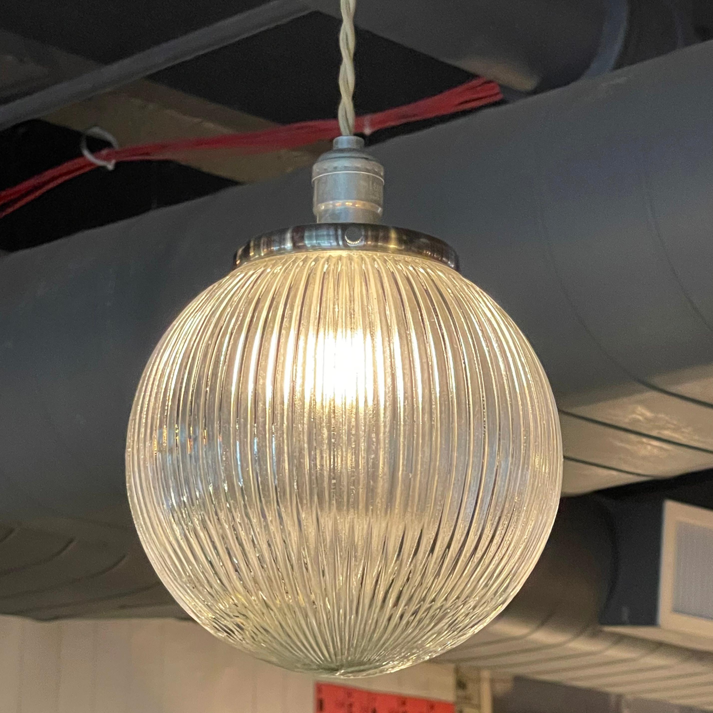 Pair of Ribbed Glass Globe Pendant Lights In Good Condition In Brooklyn, NY