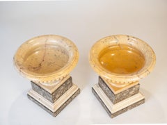 Pair Of Ribbed Vases In Giallo Antico Marble