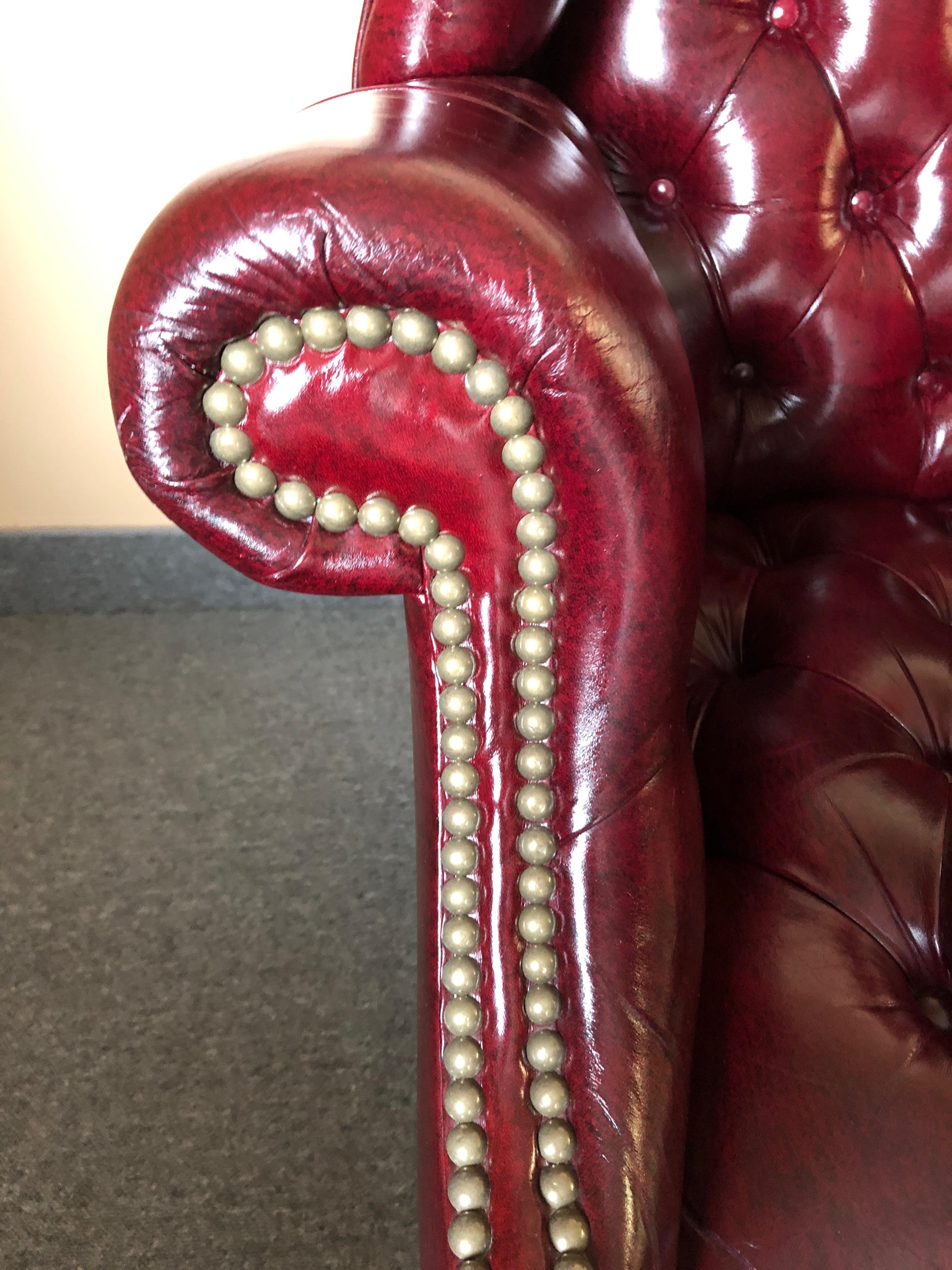 Late 20th Century Pair of Rich Burgundy Leather Vintage Tufted Chesterfield Wing Chairs