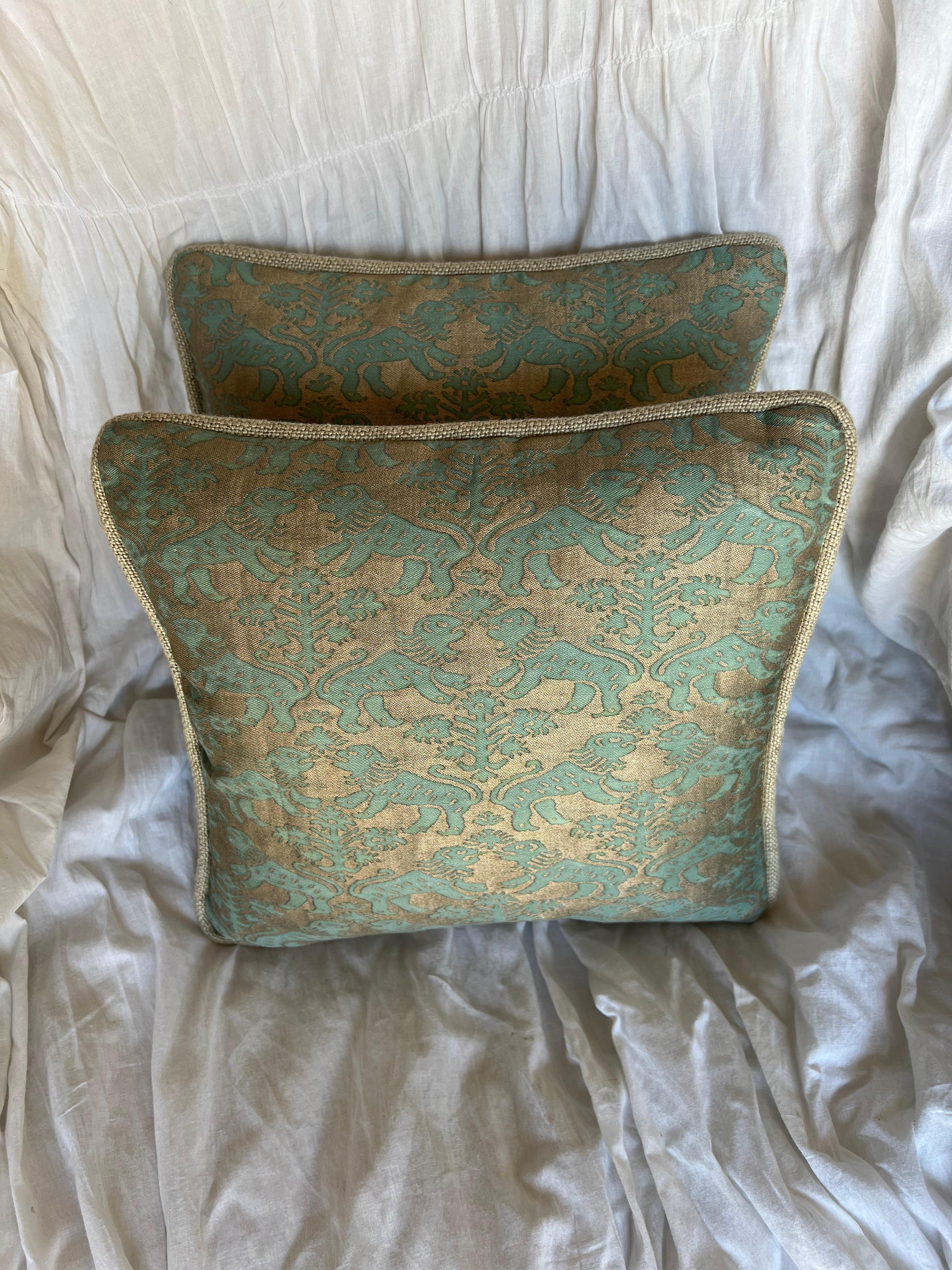 Pair of custom pillows made with vintage Richeleau patterned Fortuny textile fronts and silk backs. Zipper closures, down inserts.