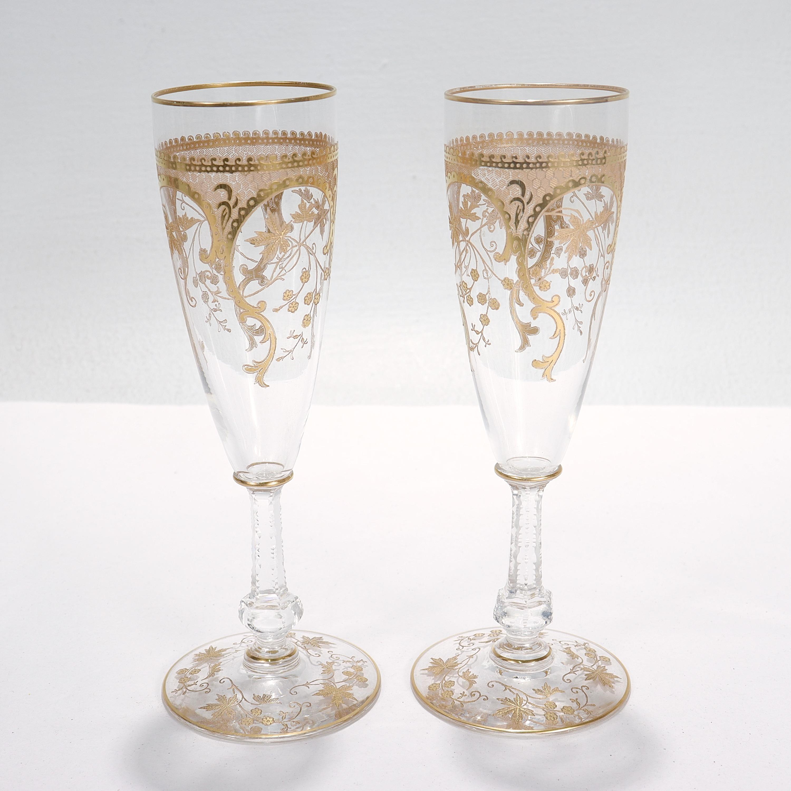 A pair of very fine old or antique champagne stems or flutes.

In molded and cut glass with finely etched & richly gilt flower & vine trellis fretwork designs throughout.

Perfect for the special toast!

Date:
20th Century

Overall Condition:
They