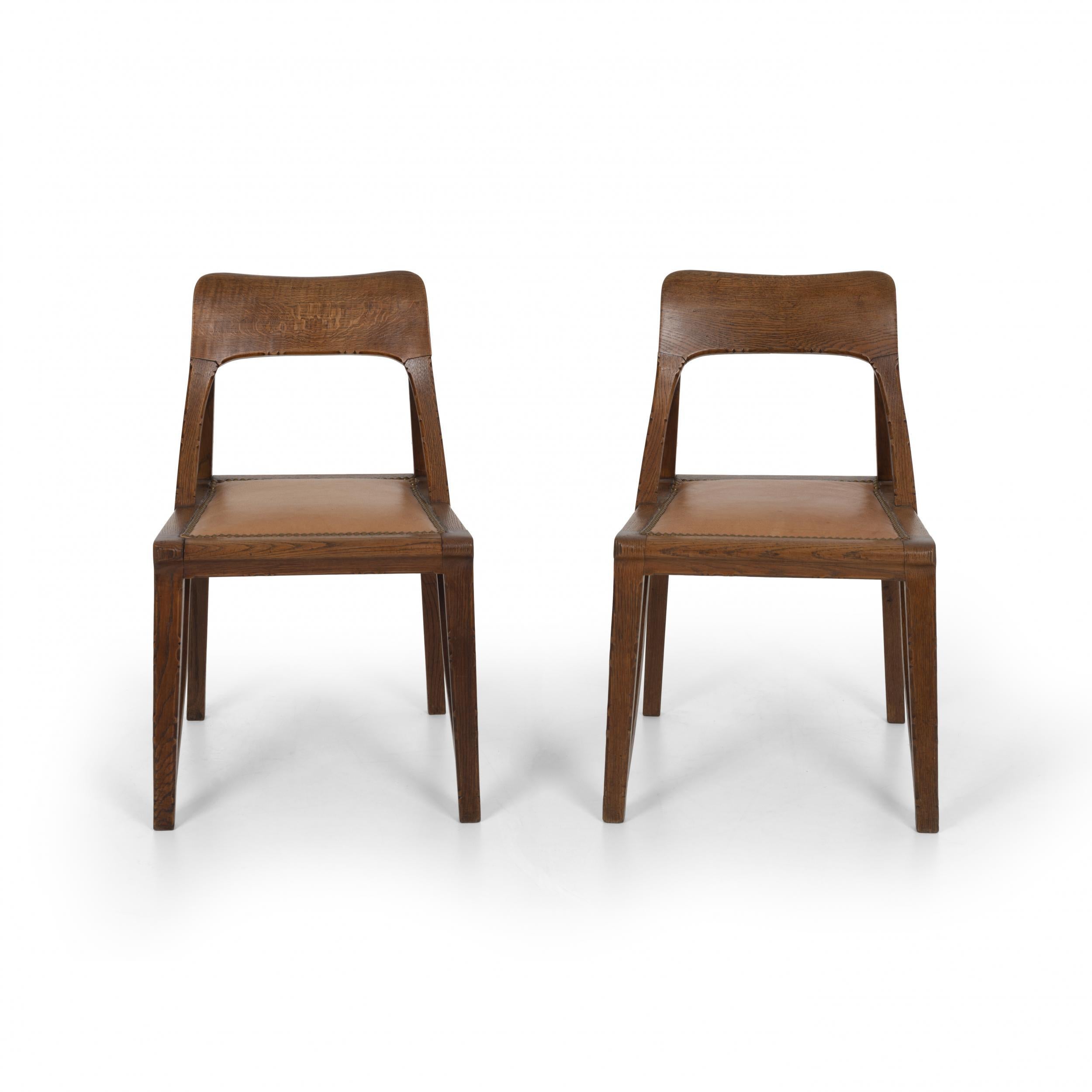 Pair of Riemerschmidt armchairs for Liberty & Co., oak, upholstered seats.
 