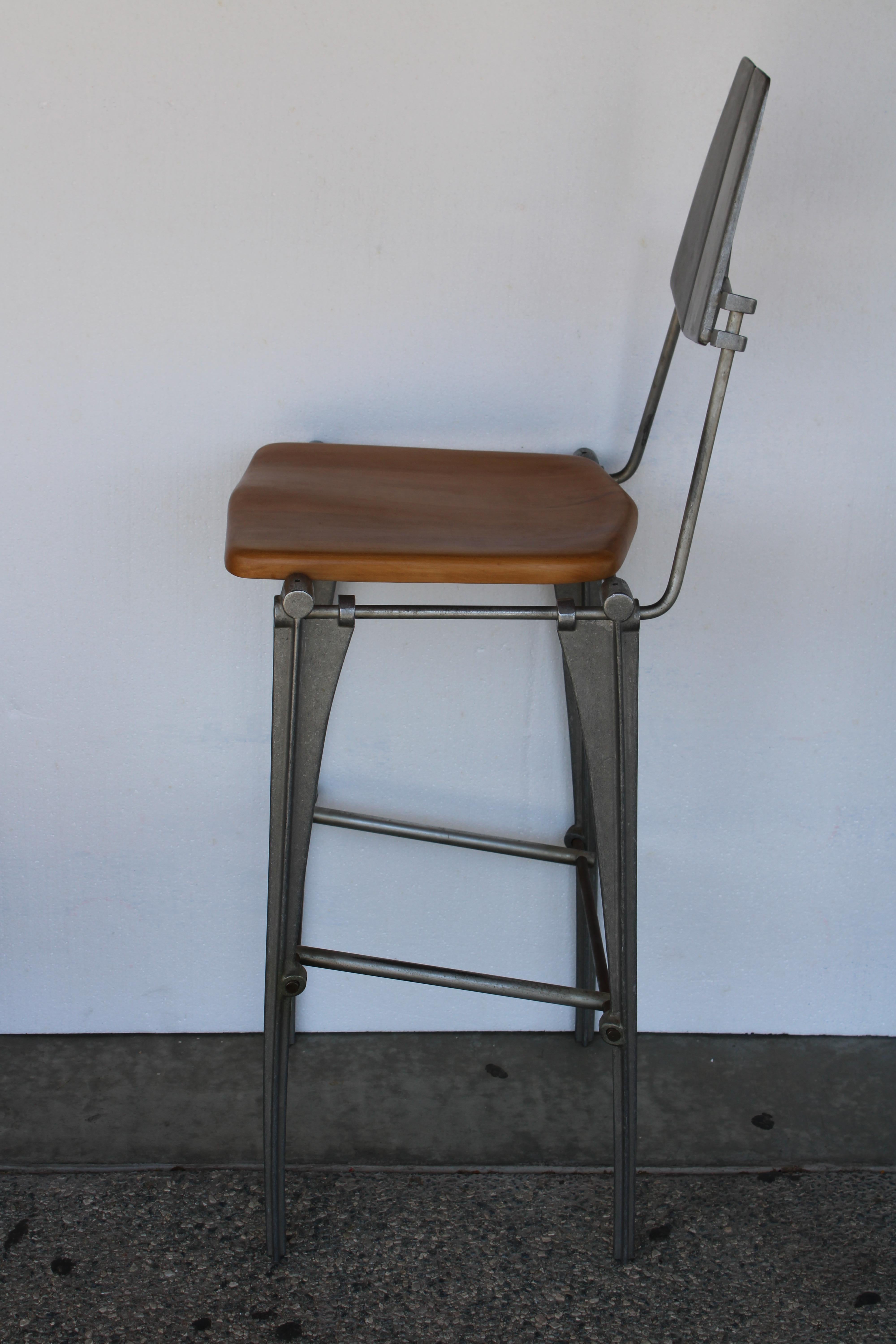 Pair of barstools by Robert Josten.  Each bar stool measures 18.75