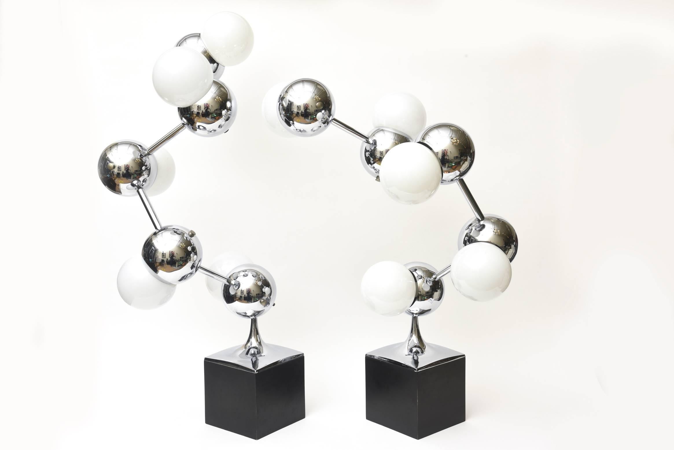 These amazing pair of large rare Mid-Century Modern Robert Sonneman chrome and wood sculptural atomic/ molecular lamps are each five lights. These particular model of these lamps are more on the rare side and the largest size made of these. This
