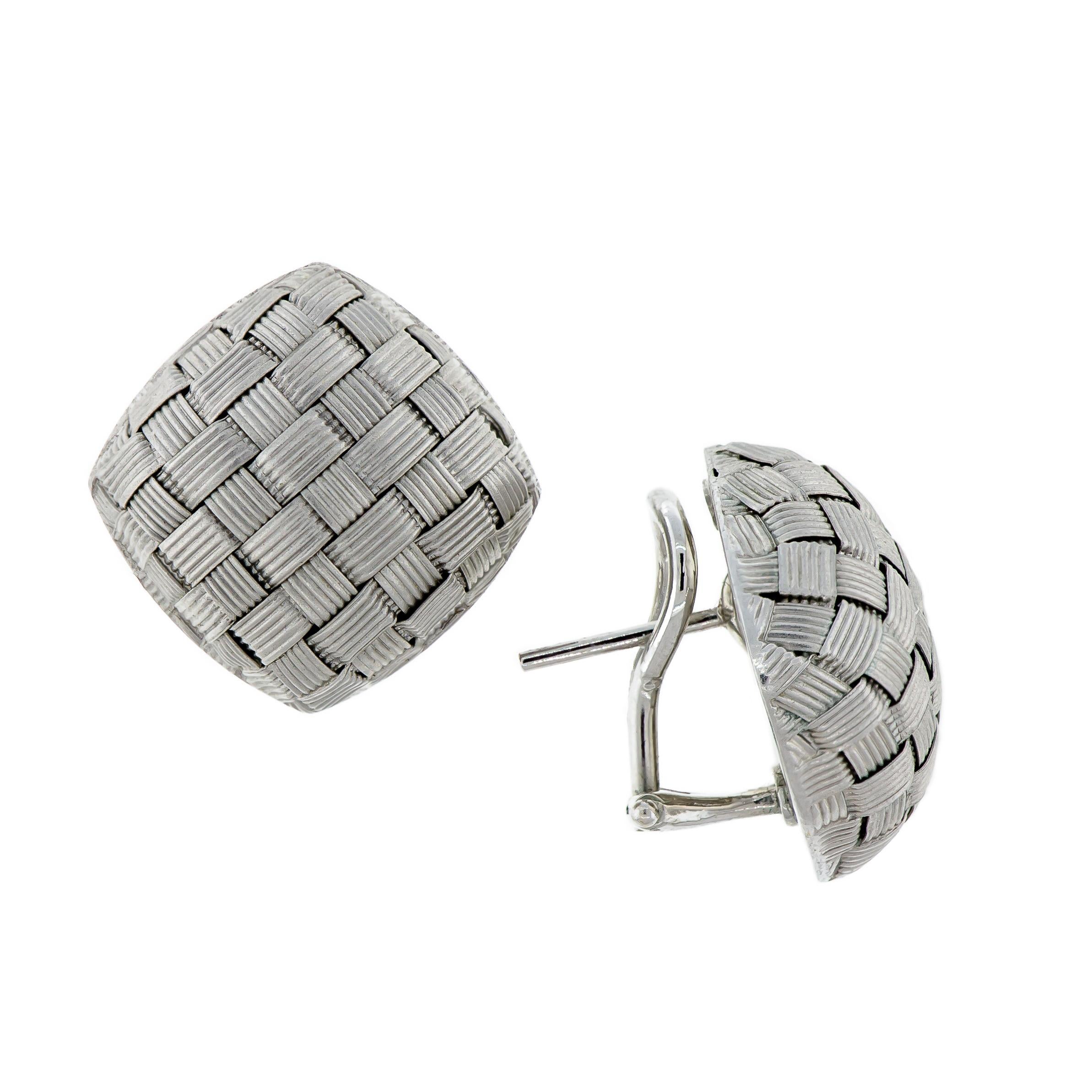A striking pair of 18 kt white gold Roberto Coin Appassionata Earclips. Decorated with a sophisticated basket-weave texture which embodies the domed surface of these square Italian earrings. Each one has a stamp on the reverse that sits under each