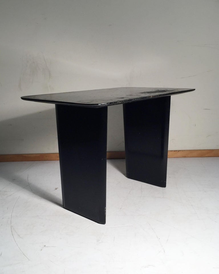 A strong pair of Robsjohn Gibbings designed black end or side tables. These need to be refinished. 