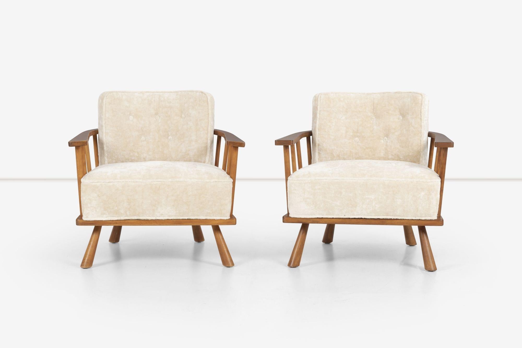 Pair of Robsjohn-Gibbings, for Widdicomb Lounge Chairs, Model 1651. Frame made of solid maple spindles which secure tub, reupholstered with heavy plush cotton, button, with solid turned legs.
 
Seat height: 16.5