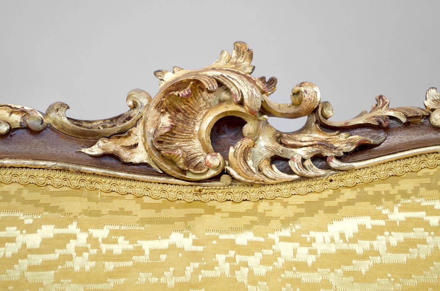 Carved Pair of Rocaille Style Natural Walnut Bergère, Gilt Highlights, circa 1880