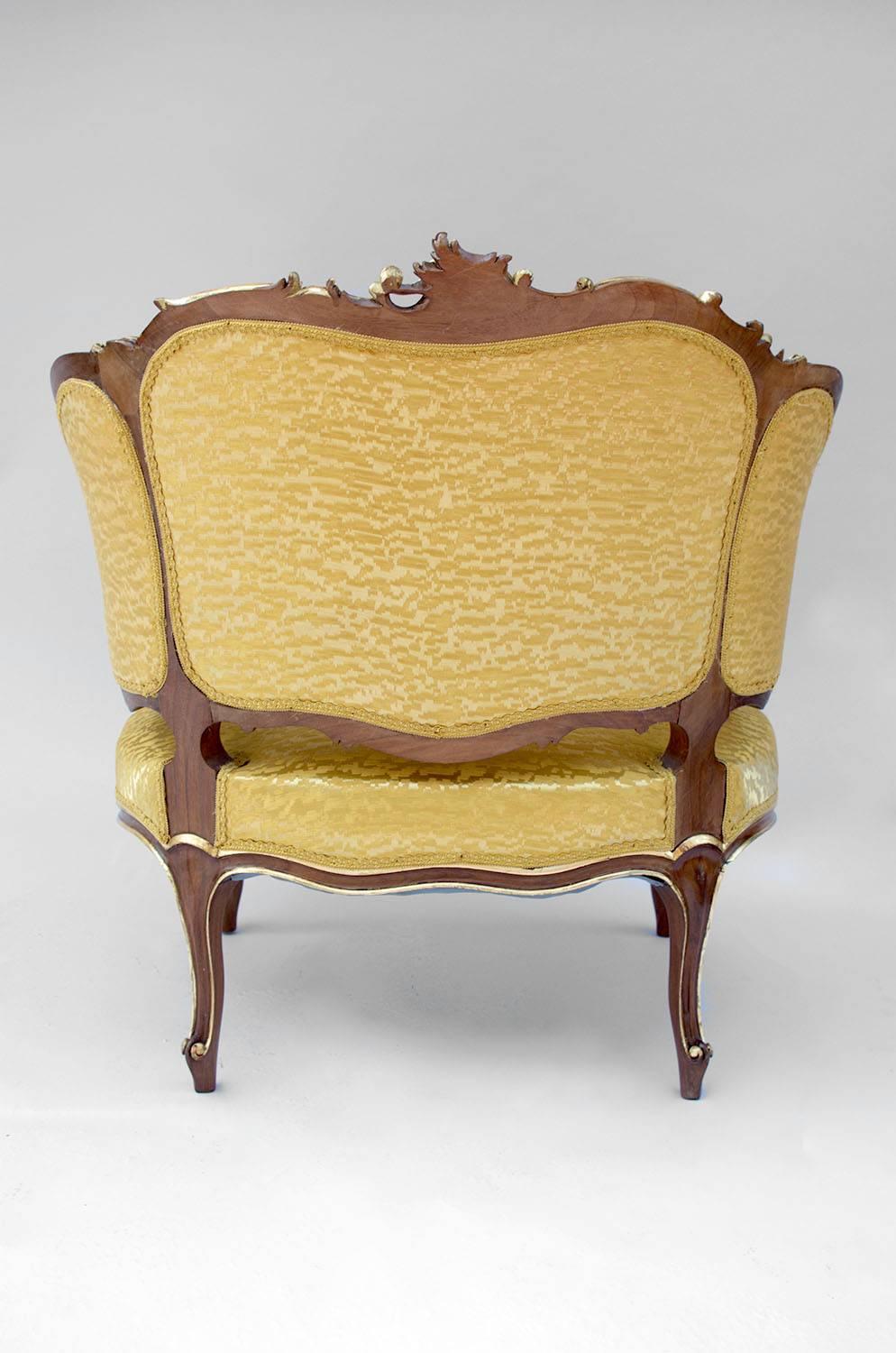 19th Century Pair of Rocaille Style Natural Walnut Bergère, Gilt Highlights, circa 1880