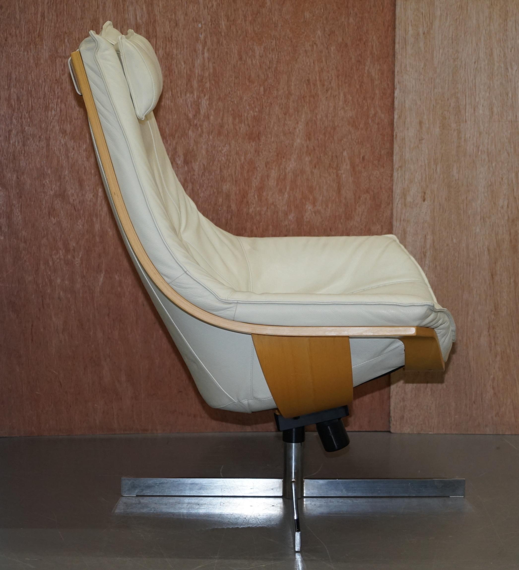 Pair of Roche Bobois Flight Swivel Cream Leather Armchairs and Ottomans 1