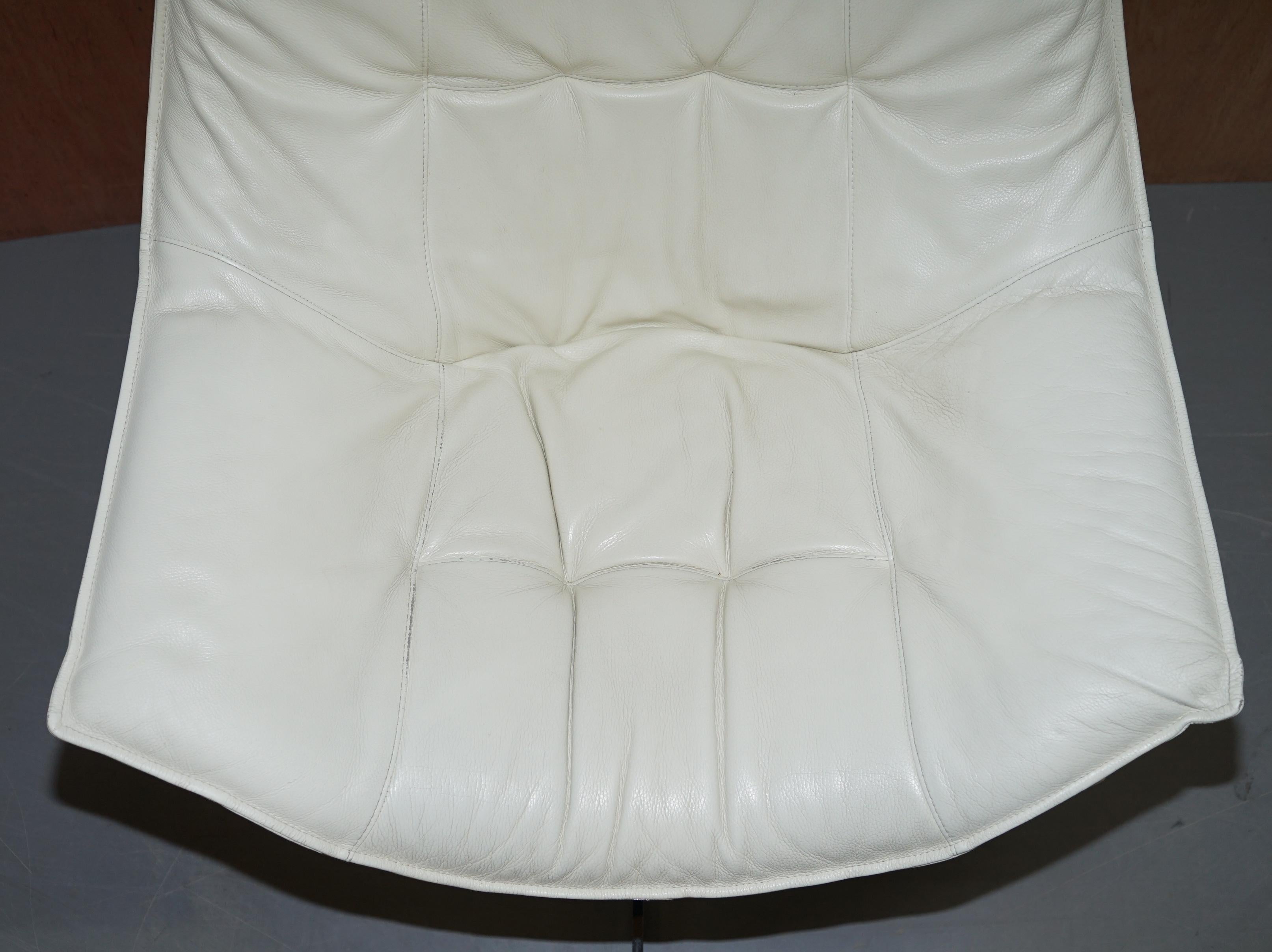Pair of Roche Bobois Flight Swivel Cream Leather Armchairs and Ottomans 10