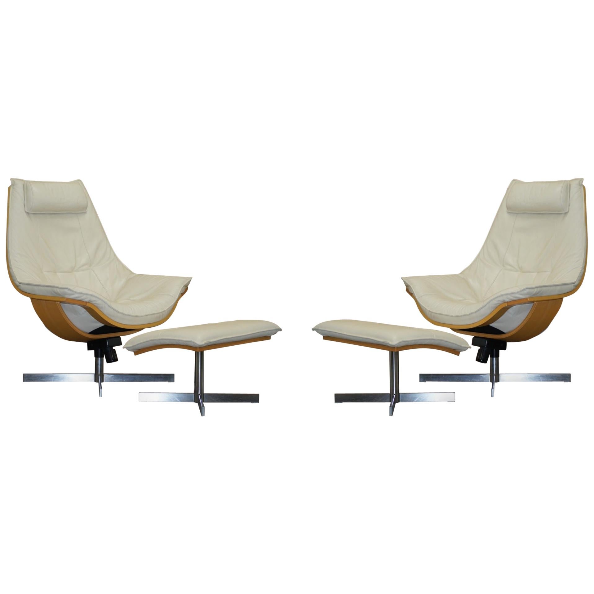 Pair of Roche Bobois Flight Swivel Cream Leather Armchairs and Ottomans