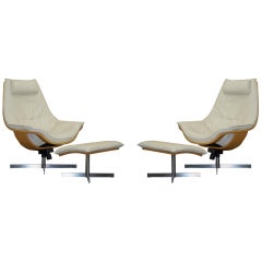 Paire de fauteuils et d'ottomans Flight Swivel Cream de Roche Bobois