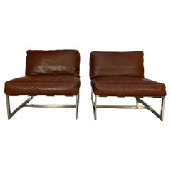 Pair of Roche Bobois Lounge Chairs - In Brown Leather and Polished Chrome