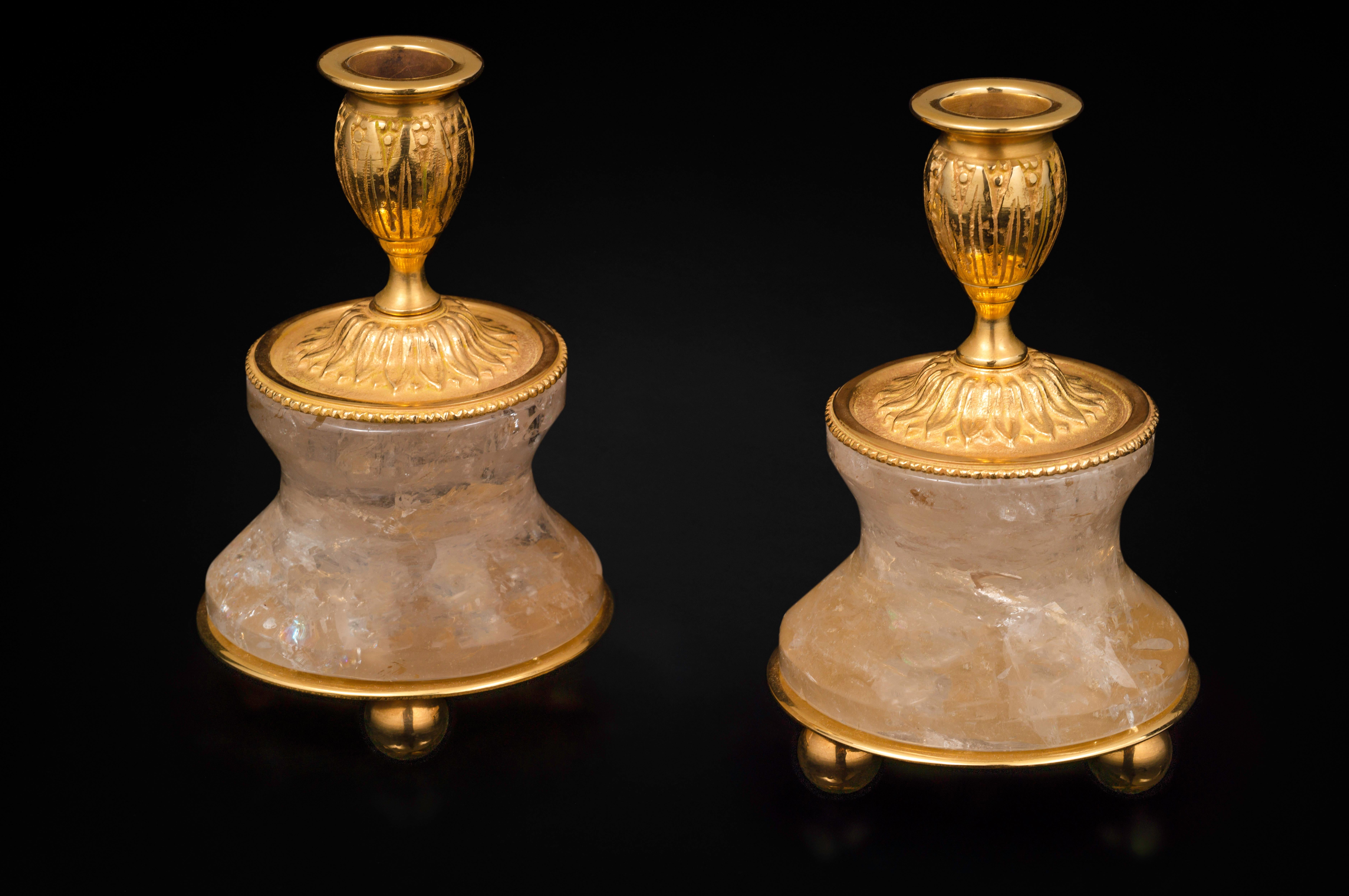 Very chic pair of rock crystal pair of lamps or candlesticks in the typic style of Louis XVI.
So you can used as you want, depend of your interiors and mood.
The base is carved in a single piece of rock crystal stone.
The top is made in France in