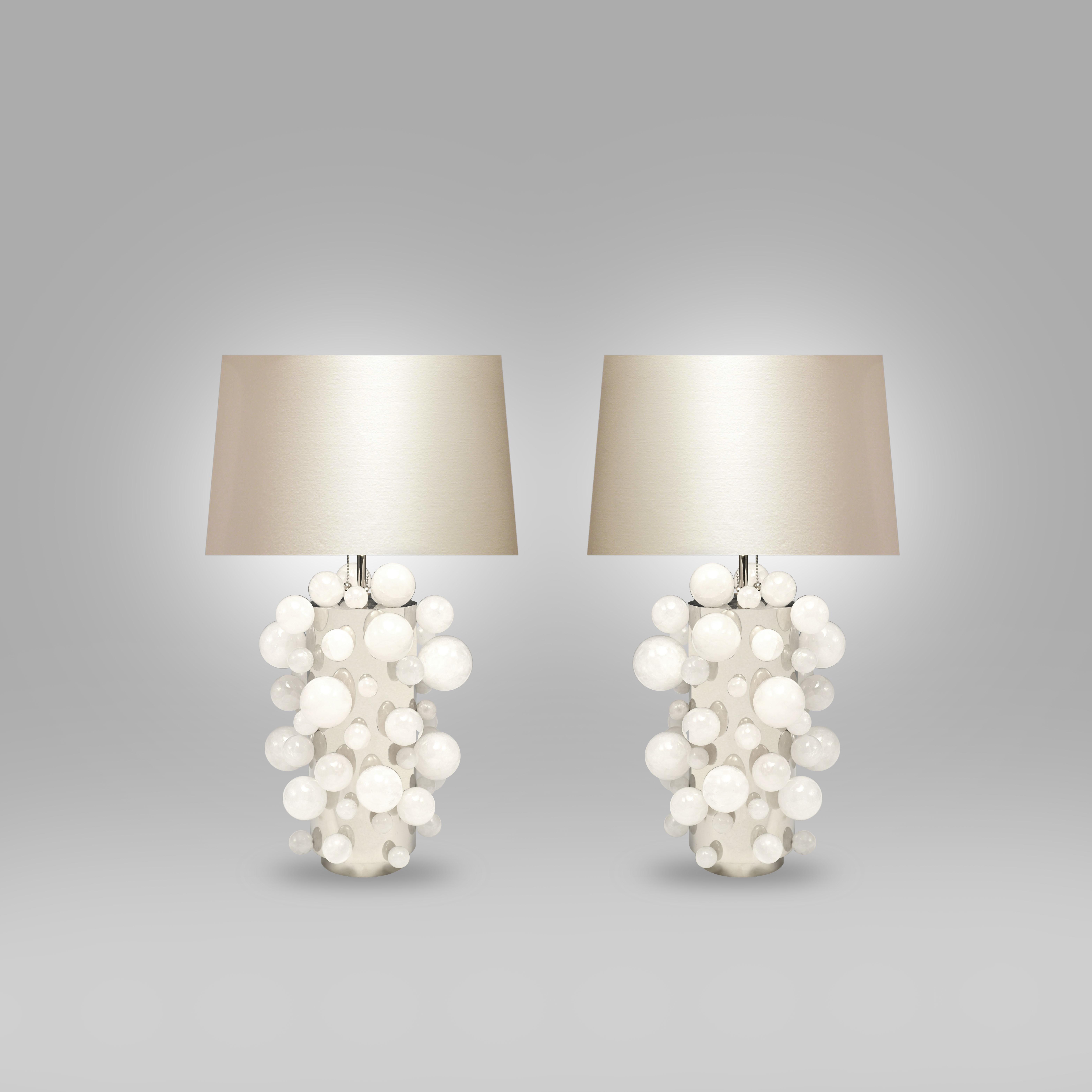A pair of luxury white rock crystal quartz bulb lamps with nickel brass bases, created by Phoenix Gallery, NYC.
To the top of the rock crystal 17inch
Lampshade not included. Custom size available.