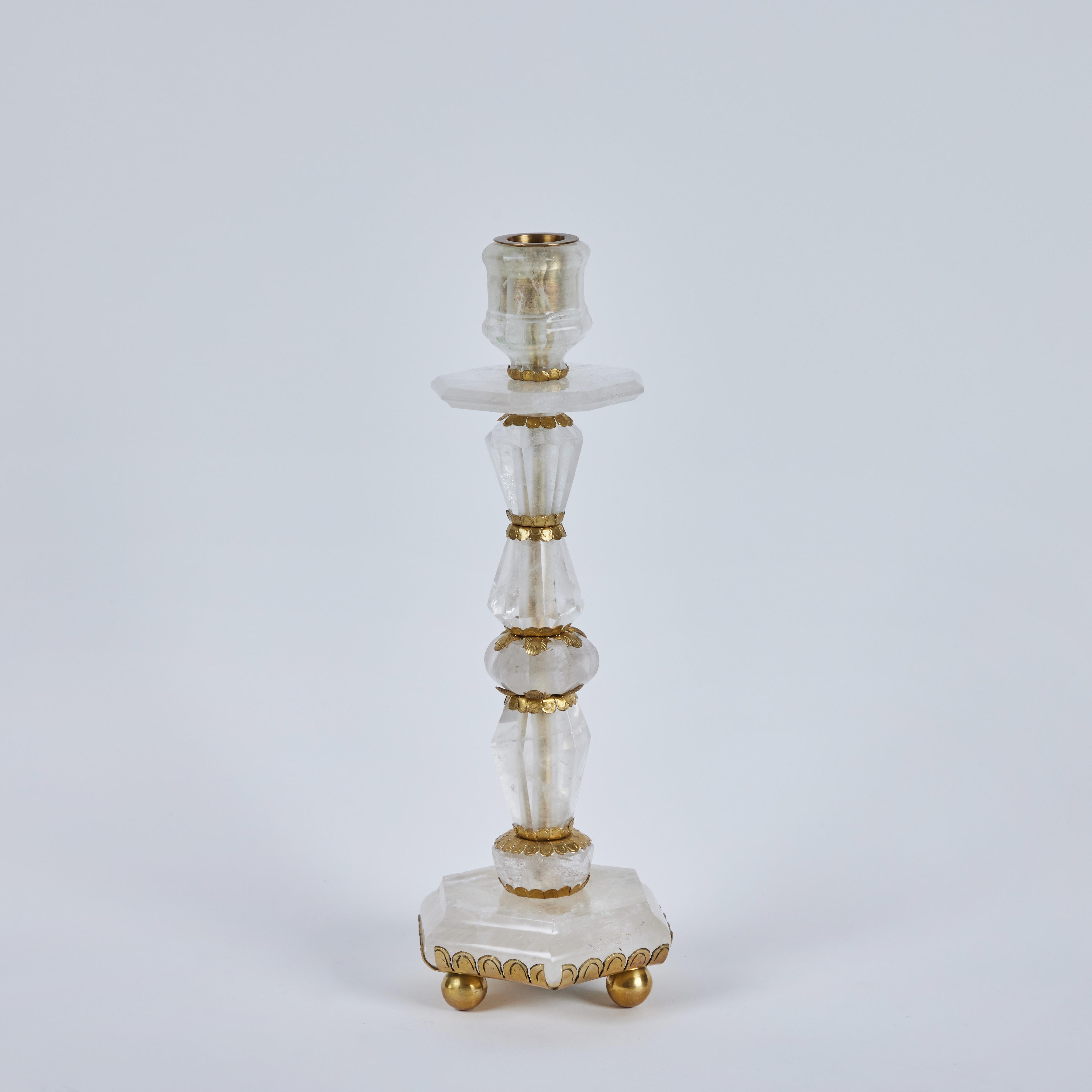 Carved and polished, tiered, faceted, rock crystal candlesticks with incised brass detail. Rock crystal from Madagascar, modern fabrication in France.