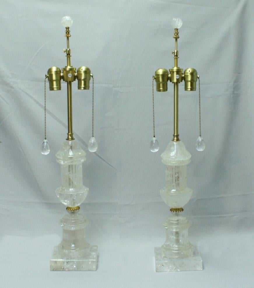 Elegant pair of Rock crystal fluted urn lamps. (A)
Each lamp with Rock Crystal pulls and finial
Meticulous attention has been given to every details
Measures: H 28