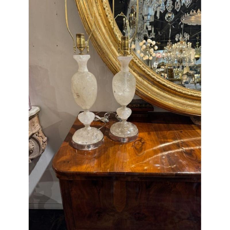 Gorgeous pair of rock crystal lamps on a Lucite base. Made in Brazil. Make a very impressive statement
16h x 6w