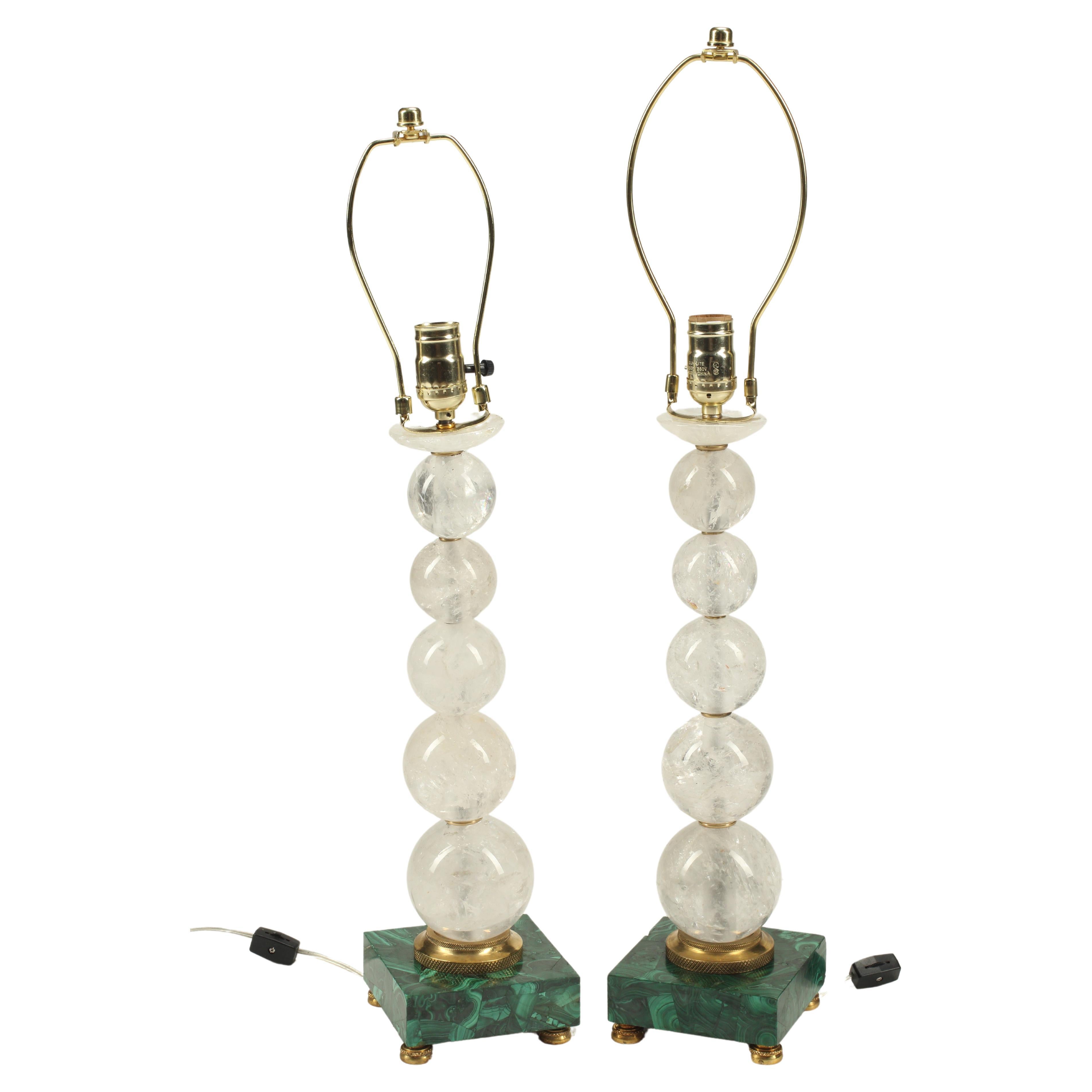 Coppia di lampade in cristallo di rocca su basi in malachite, XX secolo