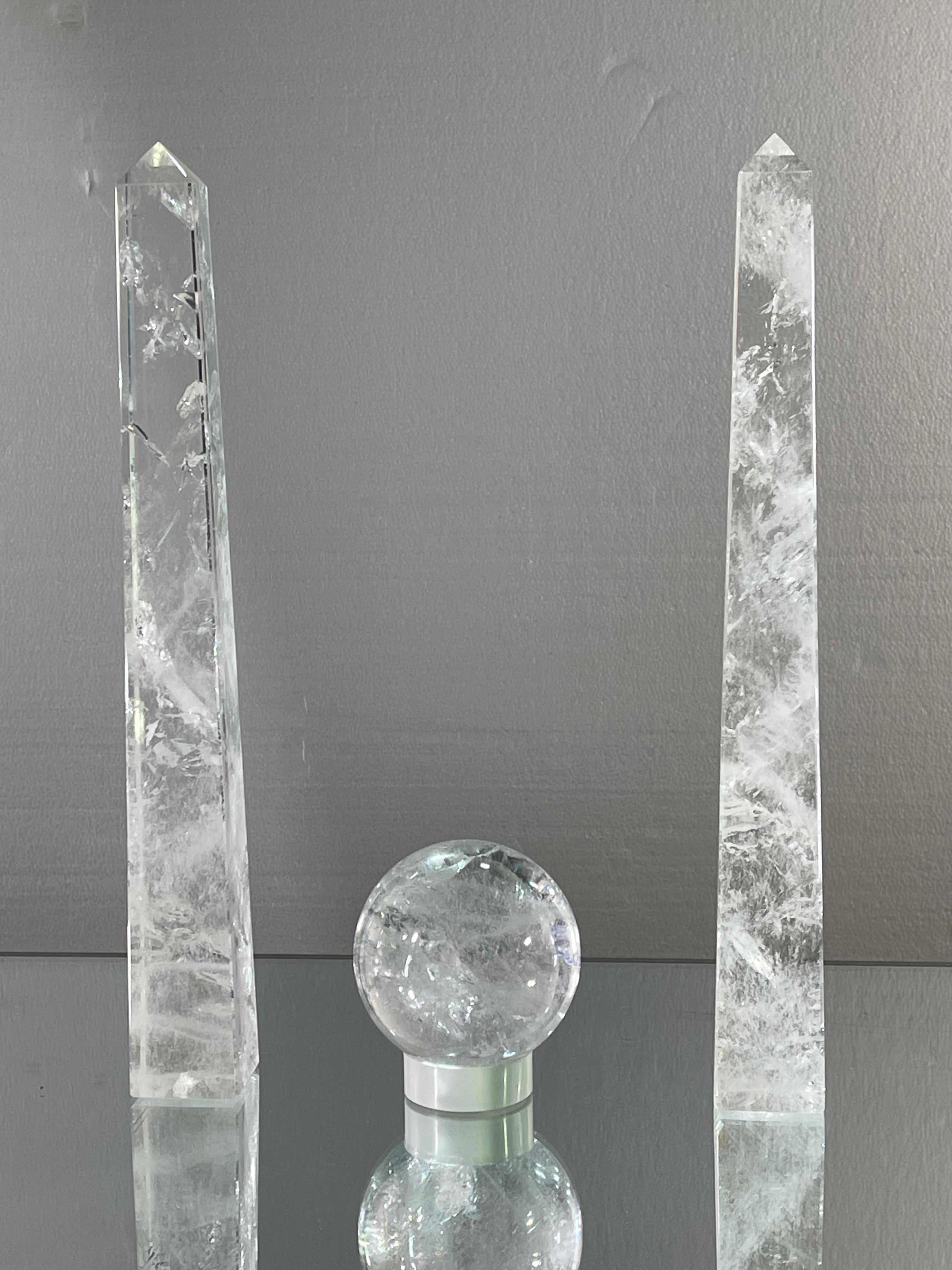 Brazilian Pair of Rock Crystal Obelisks and Sphere For Sale