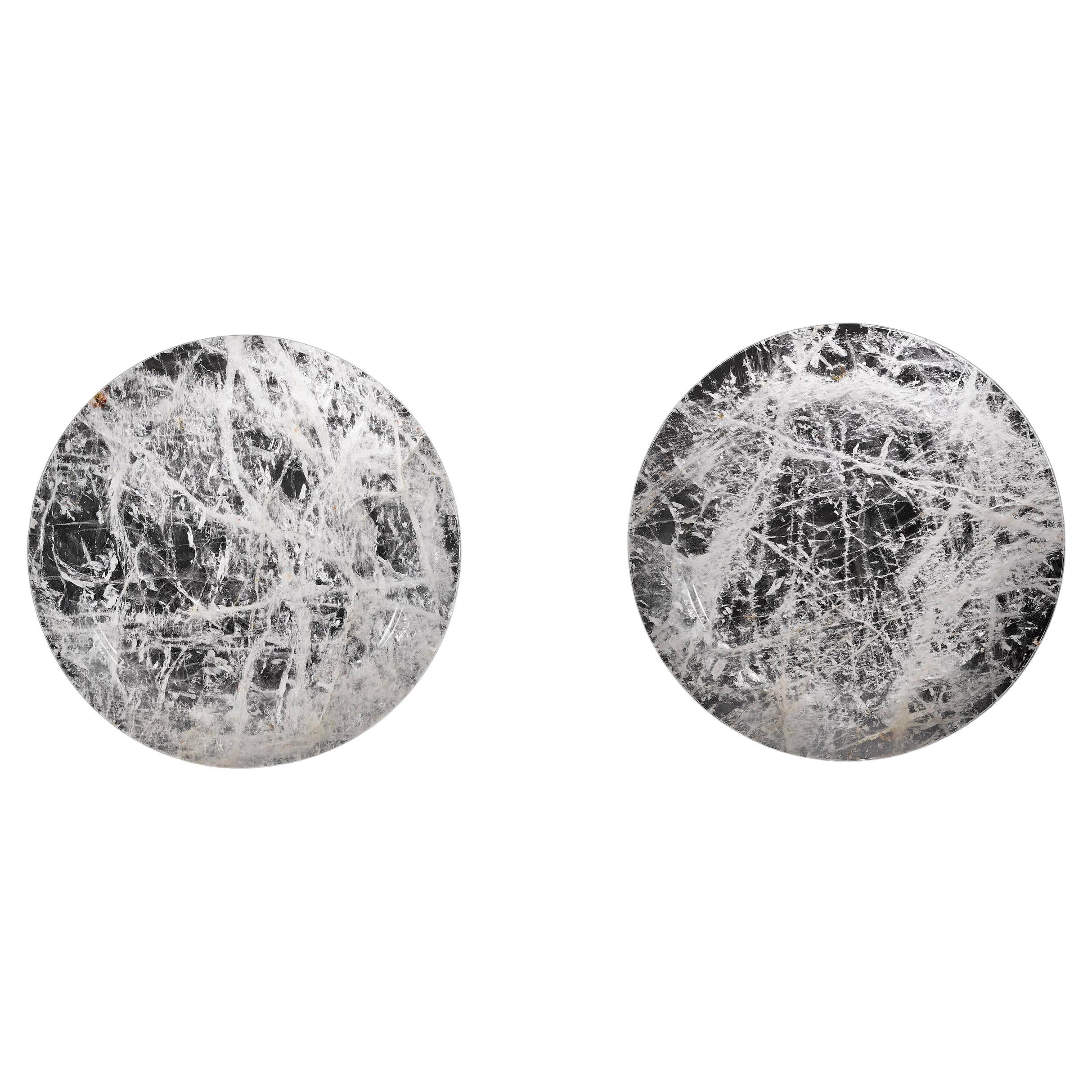 Elaborate transparent rock crystal quartz, with good transparency to form a highly decorative pair of ornamental plates (chargers) of very large diameter. The amount of rough which is wasted when carving such items is tremendous.
Diameter 15 1/2
