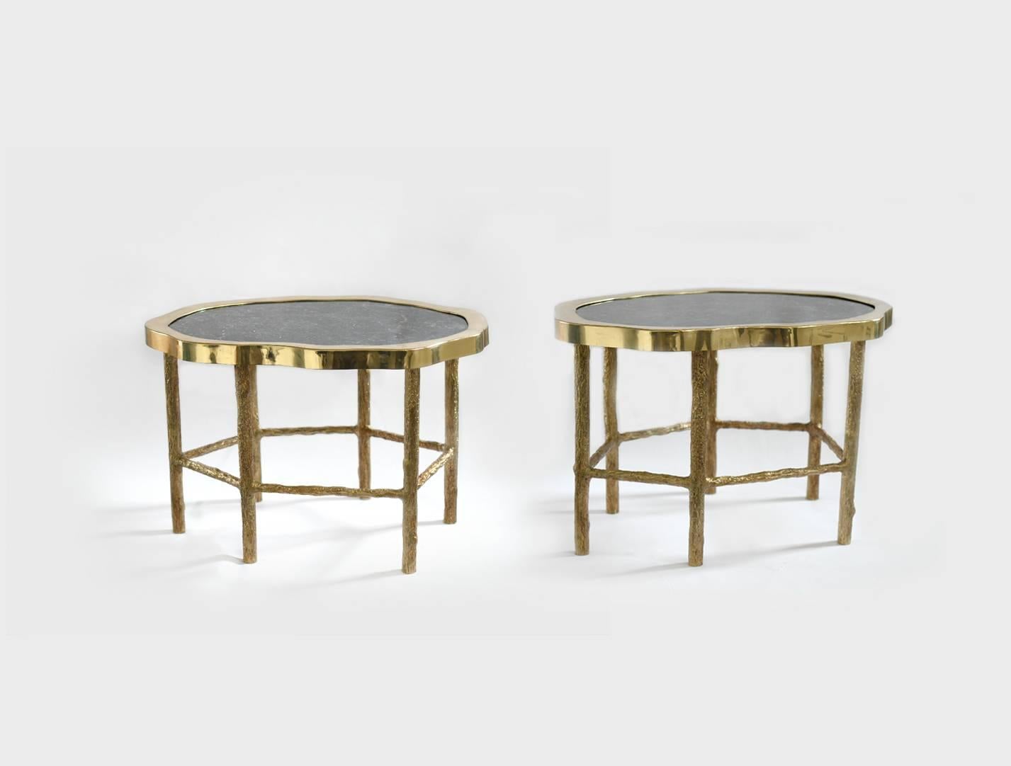 A pair of dark rock crystal quartz Cocktail Tables with hammered brass table legs, created by phoenix gallery.

 