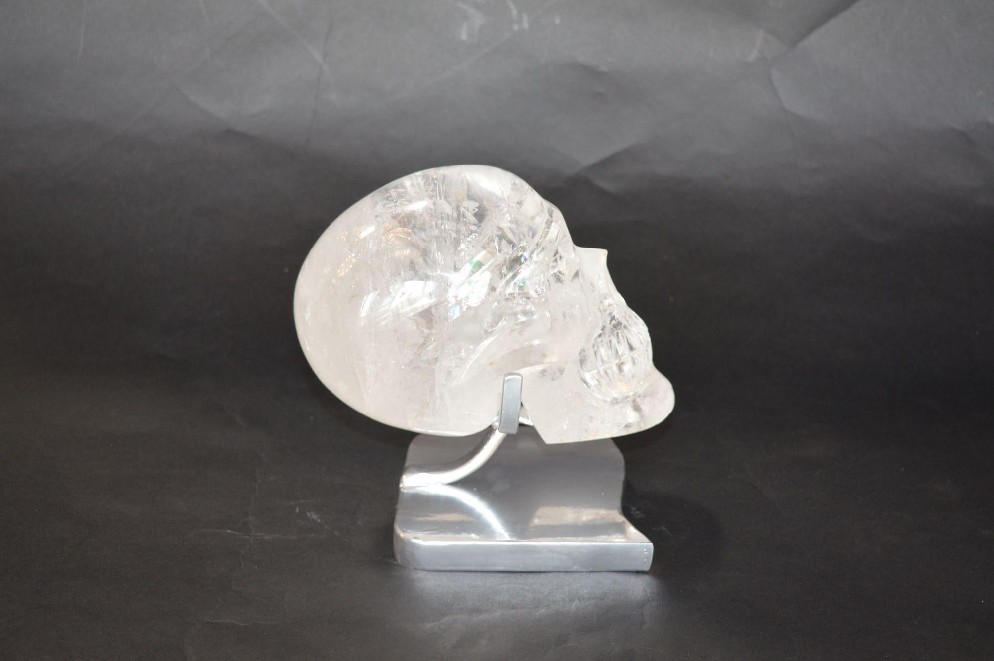 Brazilian Pair of Rock Crystal Skulls on Stand For Sale