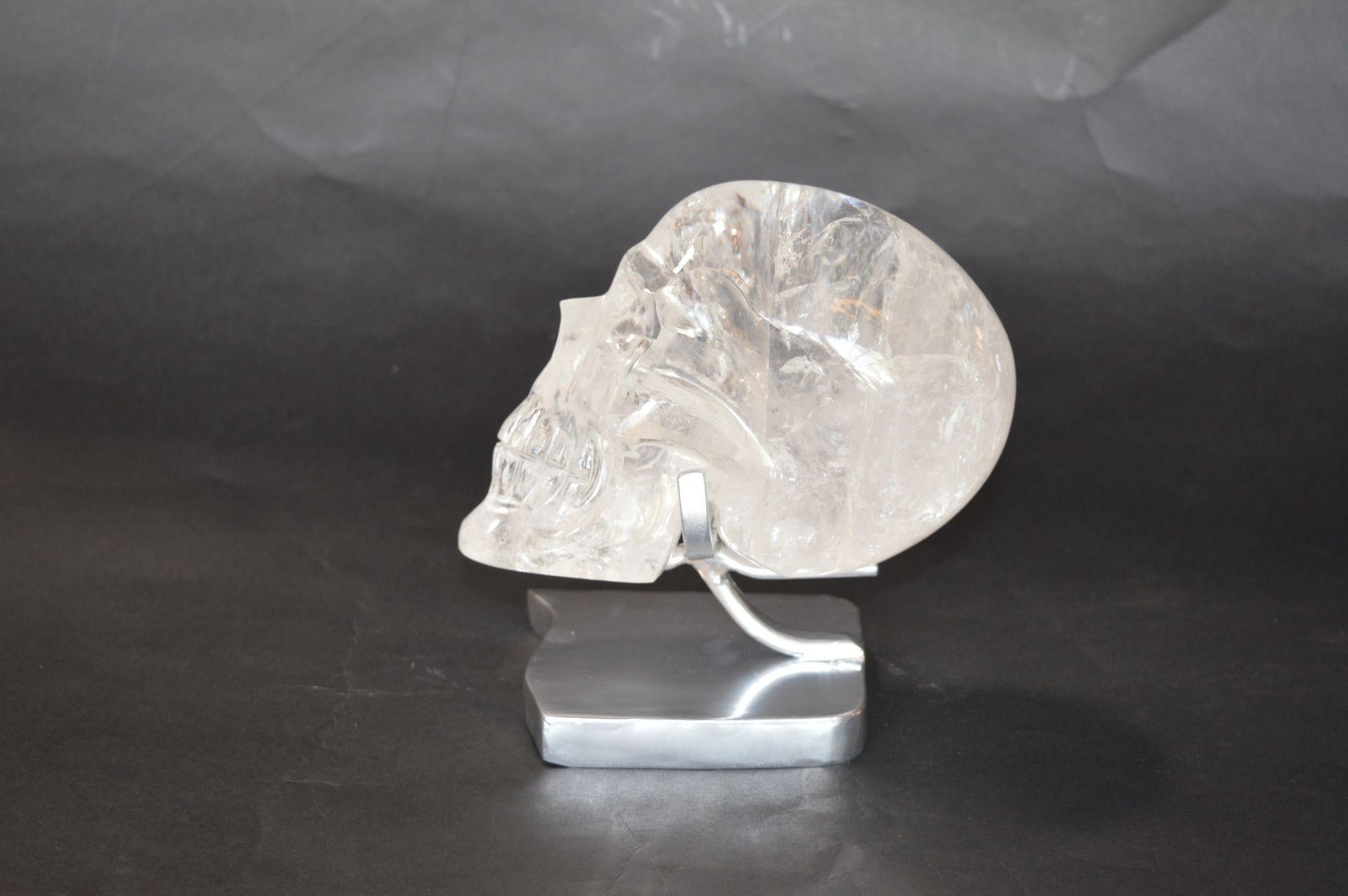 Mid-20th Century Pair of Rock Crystal Skulls on Stand For Sale