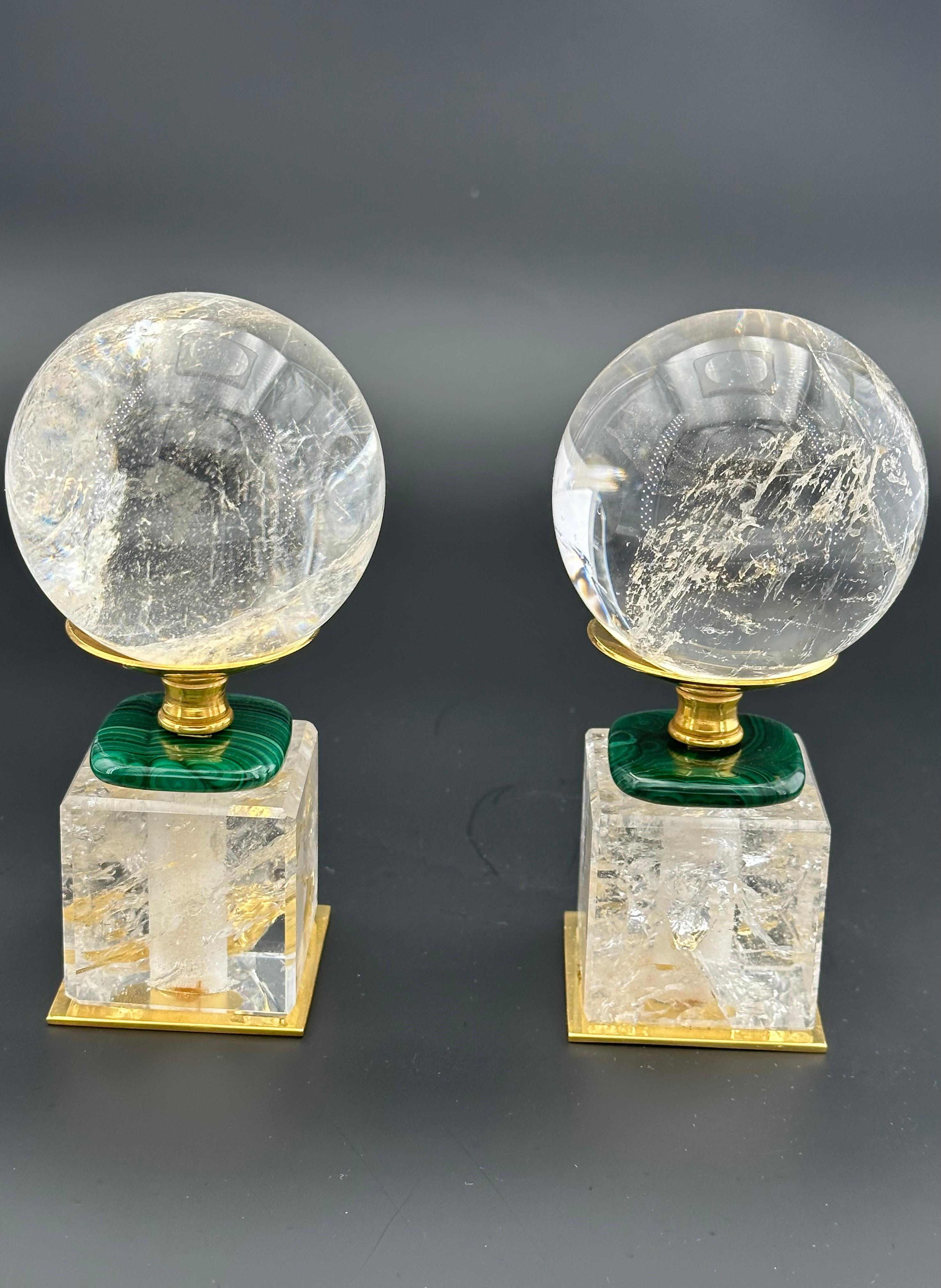 Amazing pair of rock crystal spheres (70 mm)with their customized rock crystal and malachite support and 24 K gold-plated brass.
Made in FRANCE .